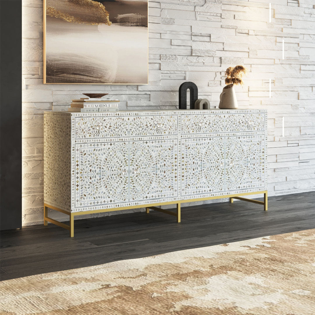Handcrafted White Sideboard Cabinet with intricate Mother of Pearl inlay, featuring a floral pattern and sleek Metal legs. A luxurious storage solution for any space.