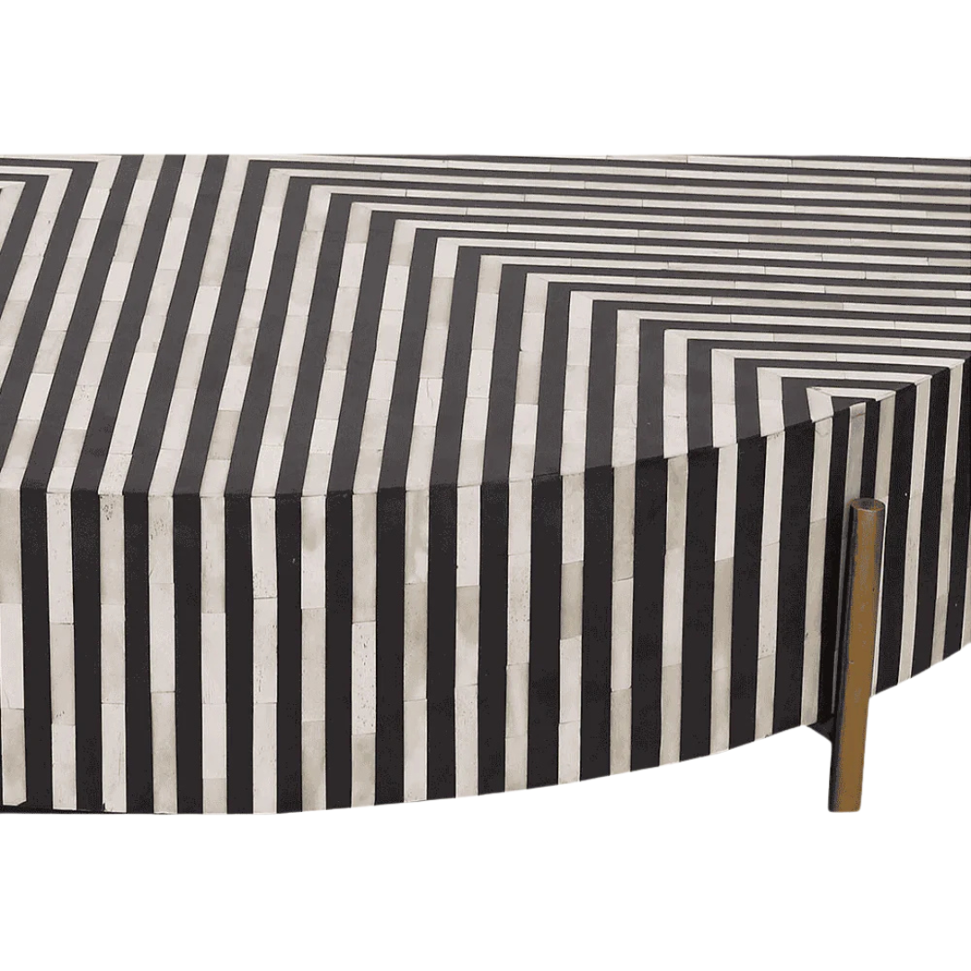 Round black bone inlay coffee table with striped design and brass legs