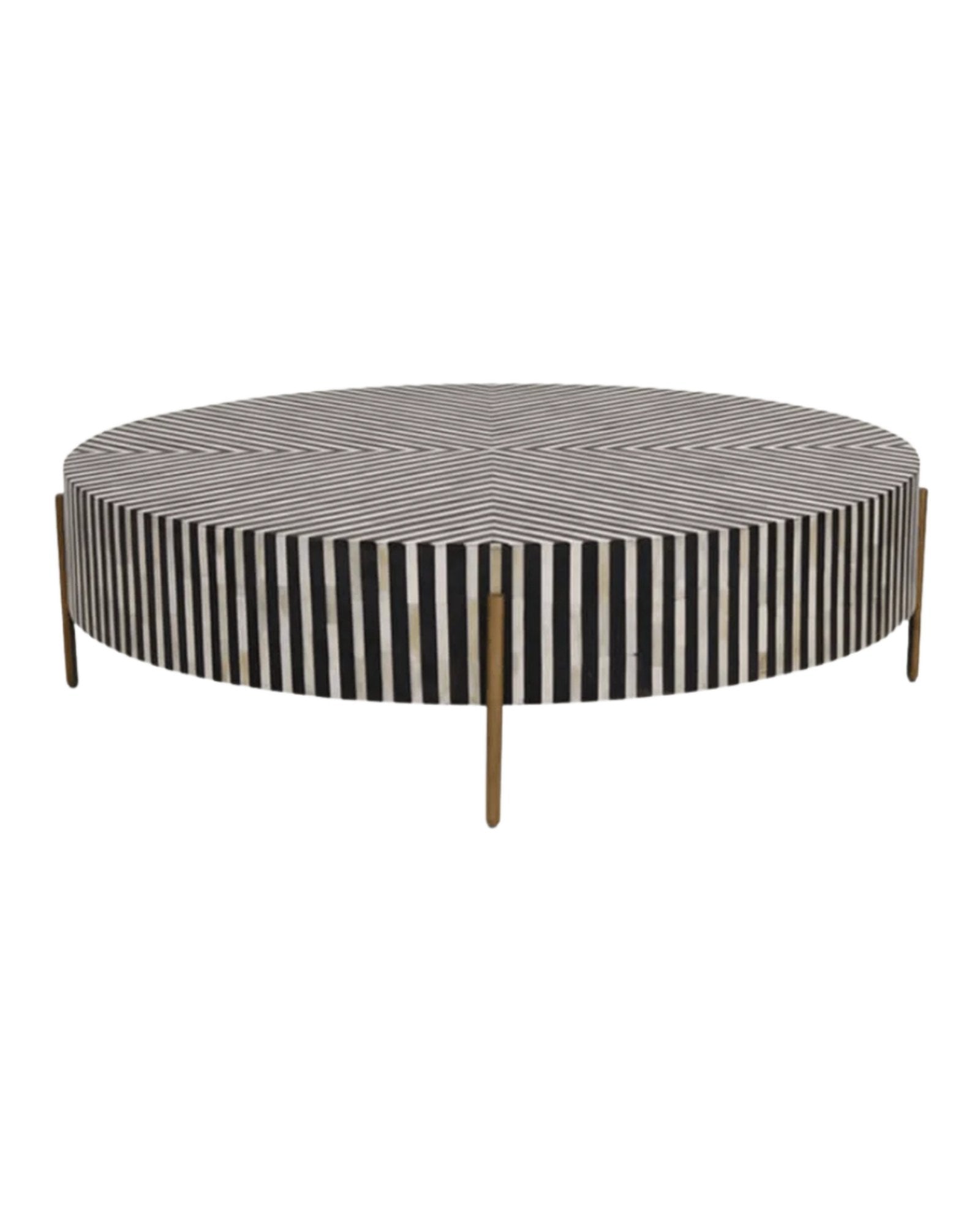 Round black bone inlay coffee table with striped design and brass legs.