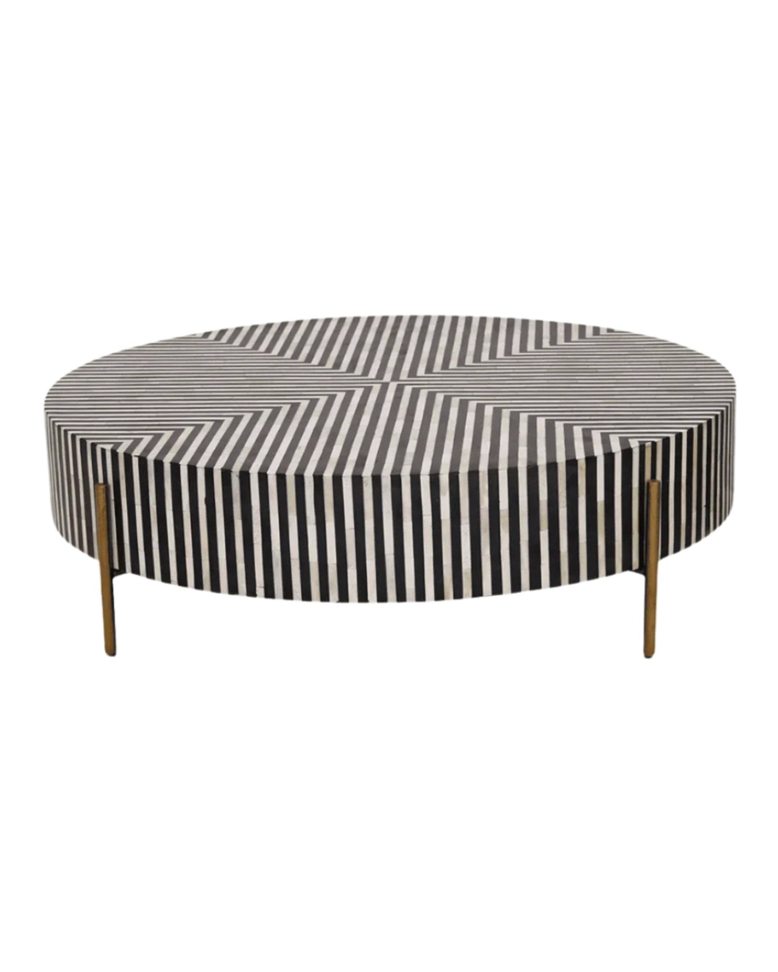 Round black bone inlay coffee table with striped design and brass legs.