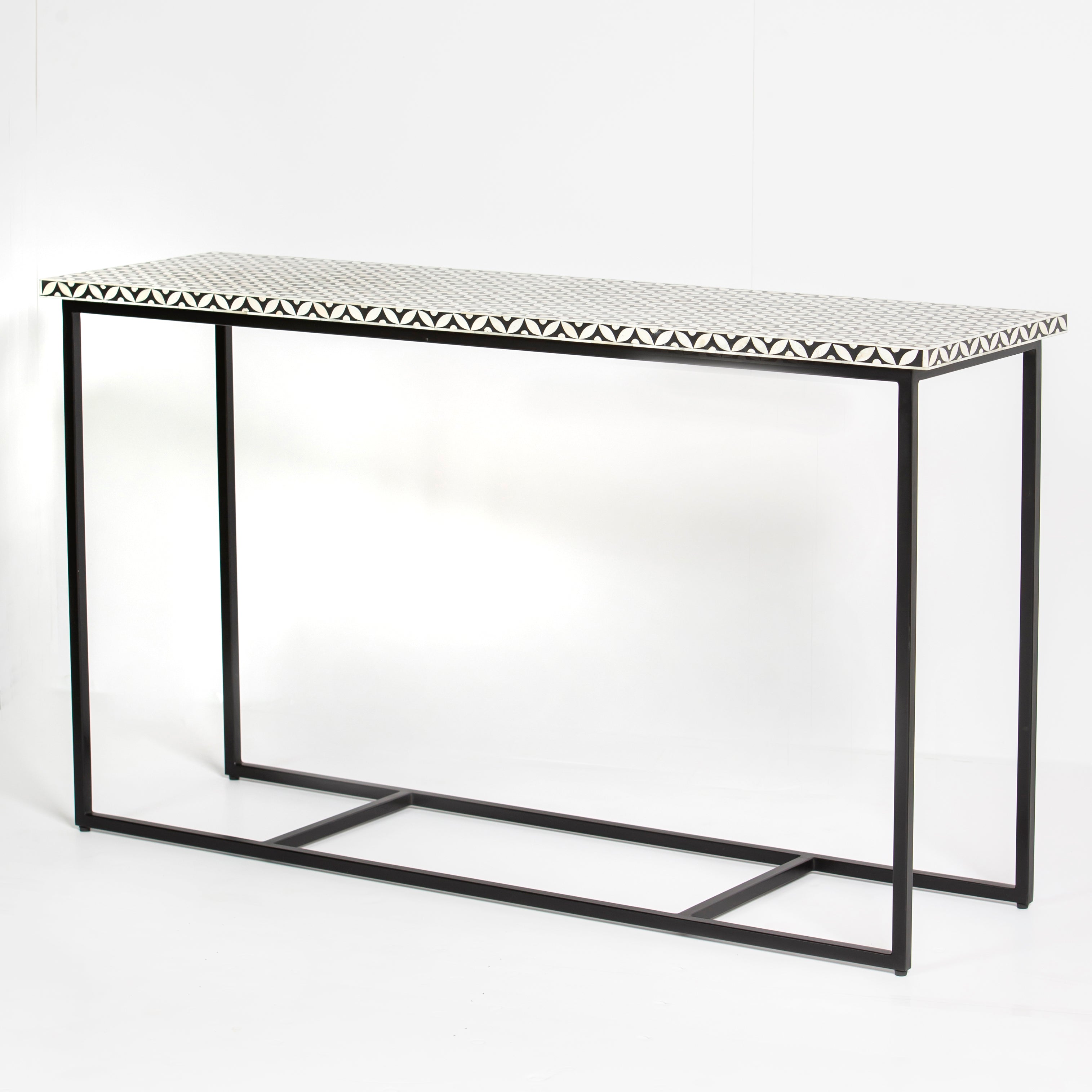 Bone inlay console table featuring geometric pattern in black and white with metal base, handcrafted furniture piece