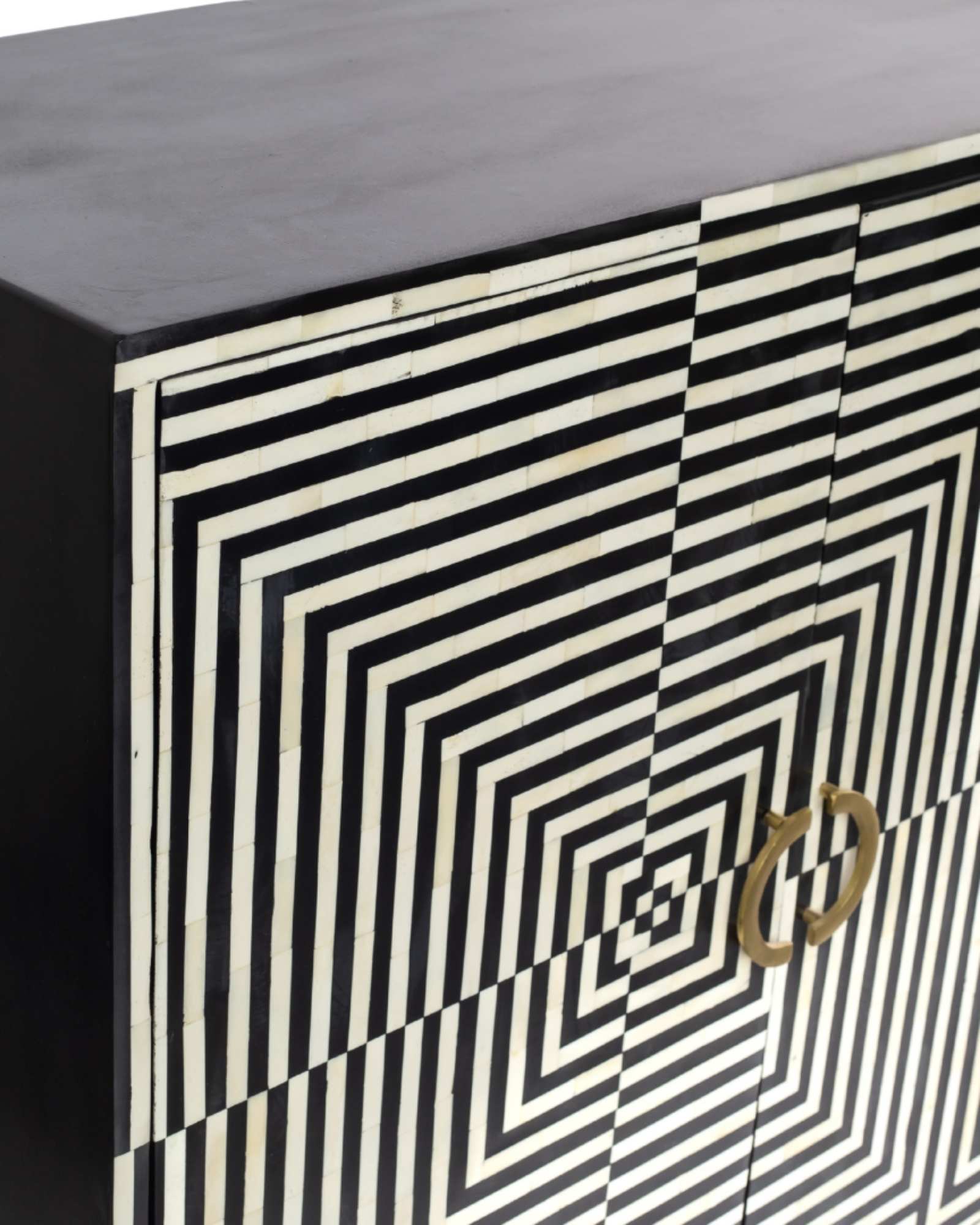 Black & White bone inlay cabinet in striped vine pattern, brass legs, and brass handles, handcrafted with spacious storage and artisanal charm.