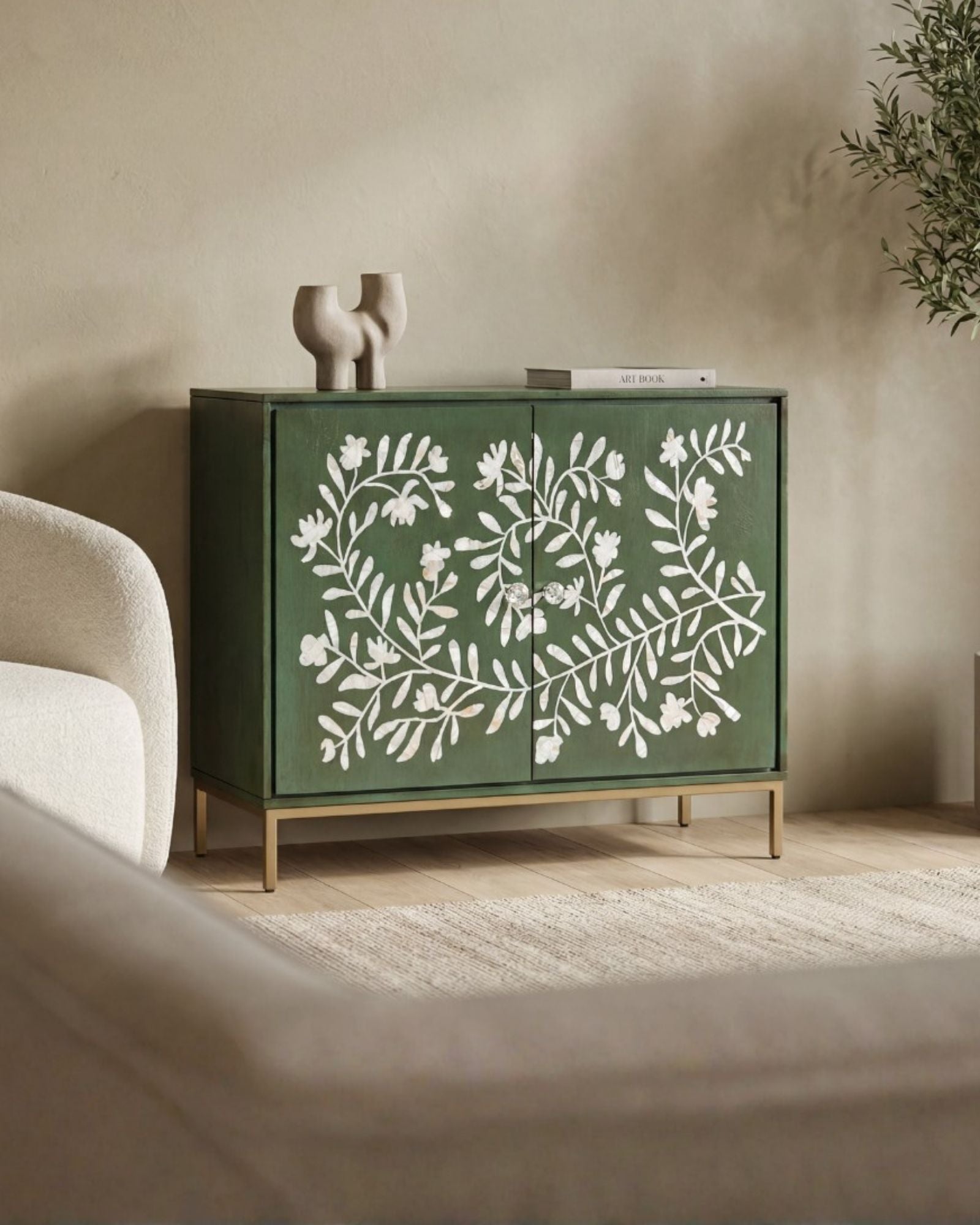 Mother of pearl inlay cabinet featuring intricate floral vine pattern in green and white, handcrafted furniture piece.