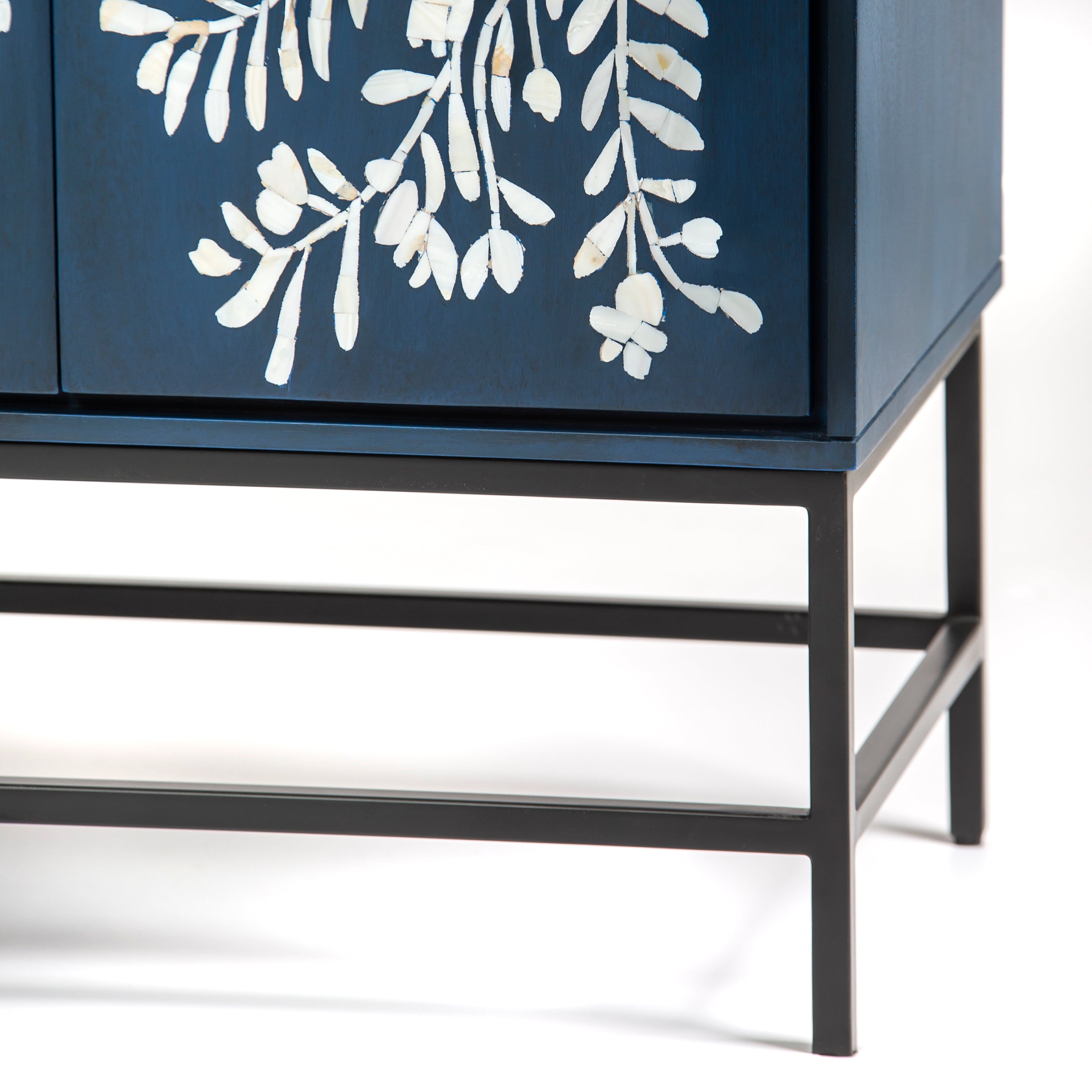 Mother of pearl inlay cabinet featuring intricate floral vine pattern in blue and white, handcrafted furniture piece