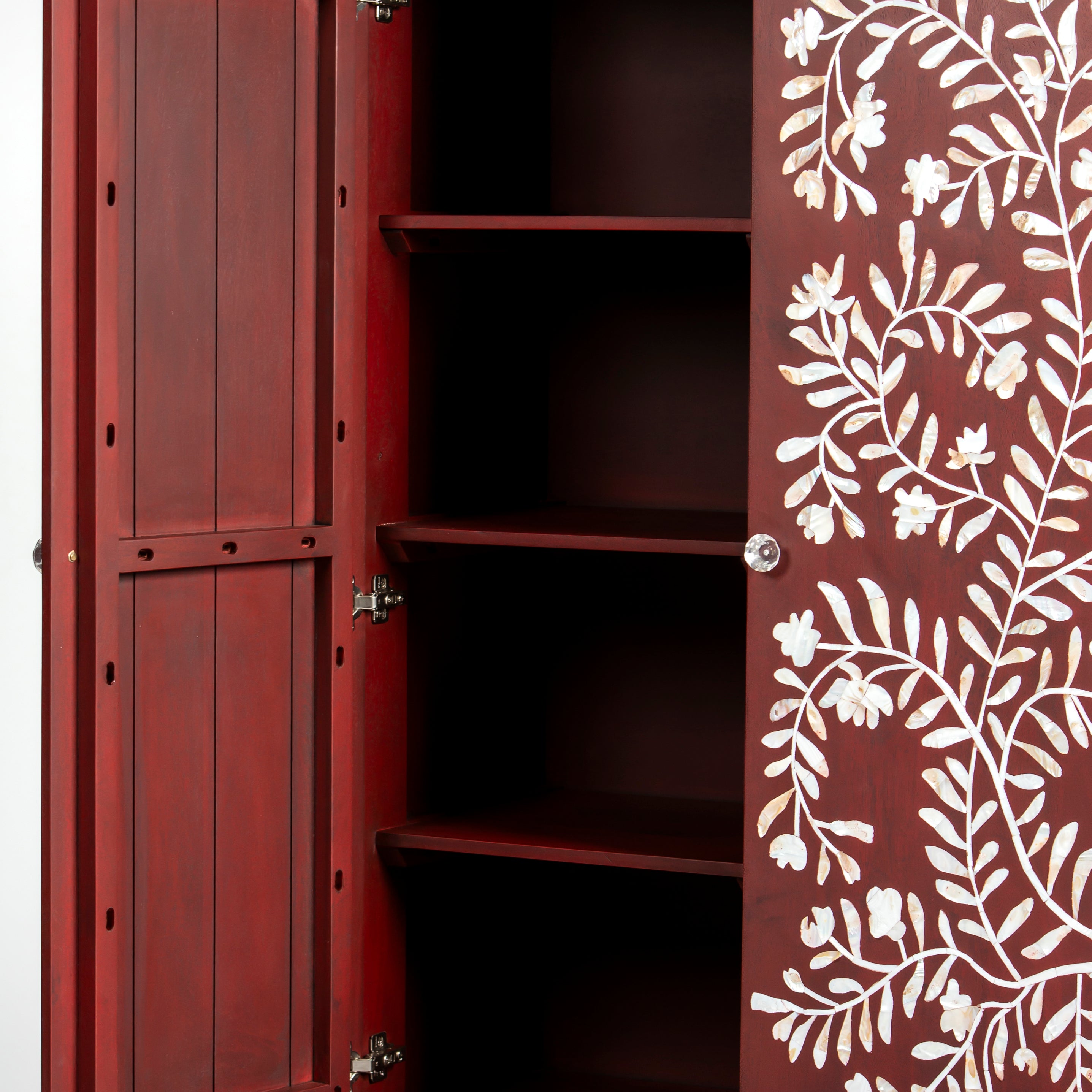 Mother of pearl inlay cabinet featuring intricate floral vine pattern in burgundy and white, handcrafted furniture piece