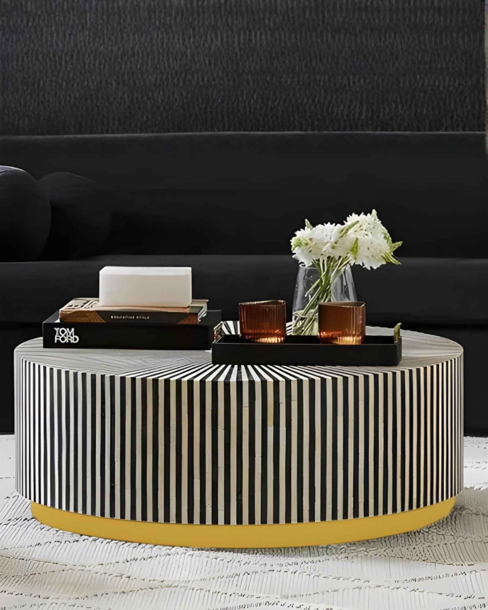 Manzil Coffee Table in black bone inlay with golden base, handcrafted with bold striped design, size 100x100x45 cm.