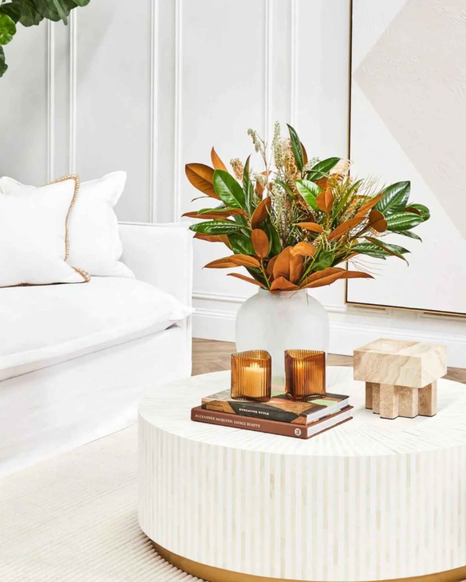 Manzil Coffee Table in black bone inlay with golden base, handcrafted with bold striped design, size 100x100x45 cm.