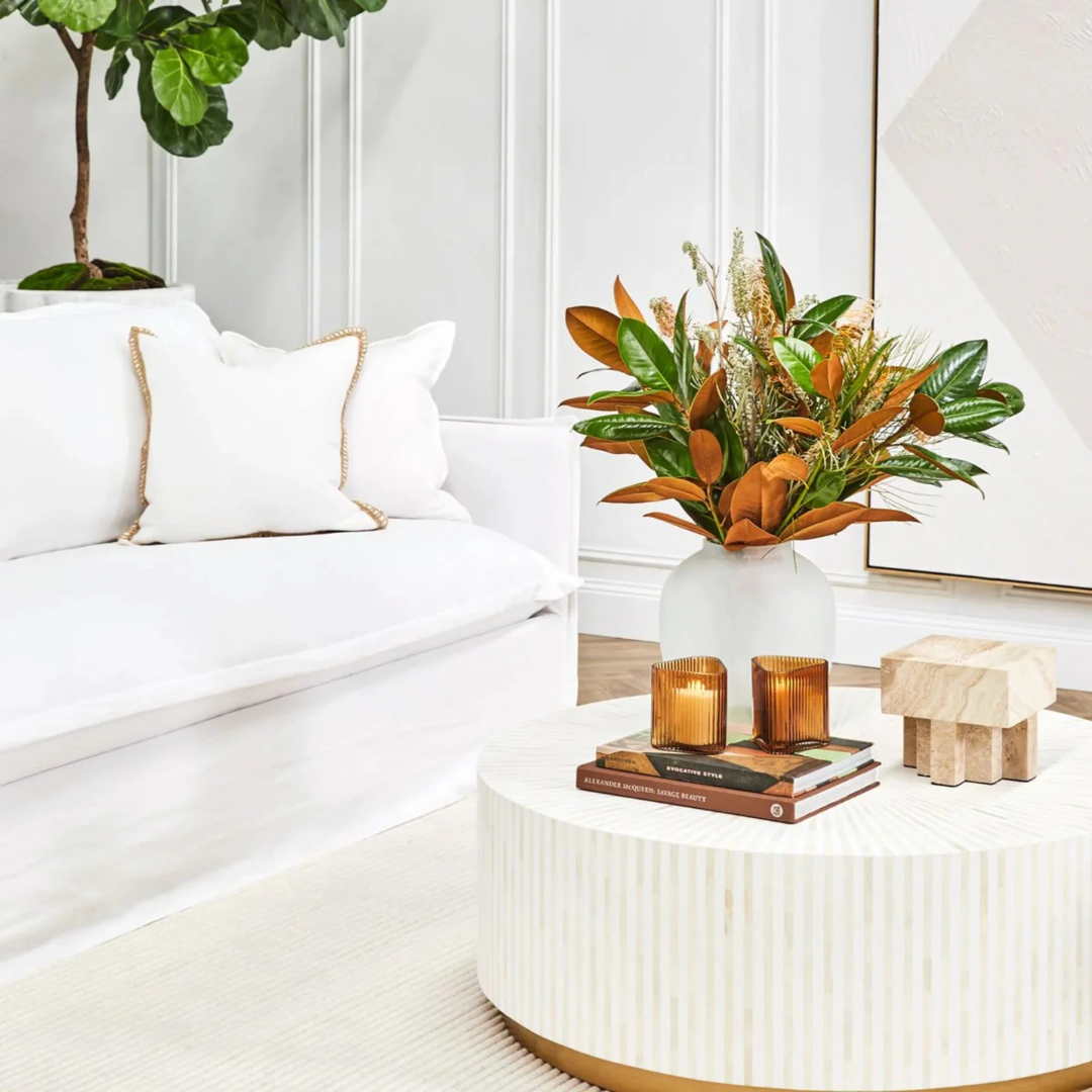 Manzil Coffee Table in black bone inlay with golden base, handcrafted with bold striped design, size 100x100x45 cm.