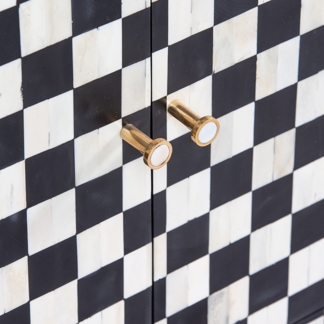 Black and white bone inlay sideboard with checkerboard pattern, featuring multiple drawers and a sleek design.