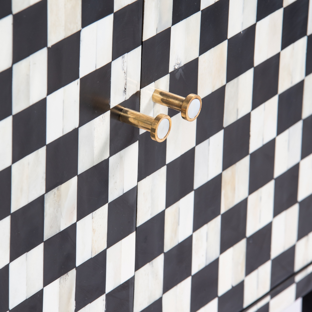 Black and white bone inlay sideboard with checkerboard pattern, featuring multiple drawers and a sleek design.
