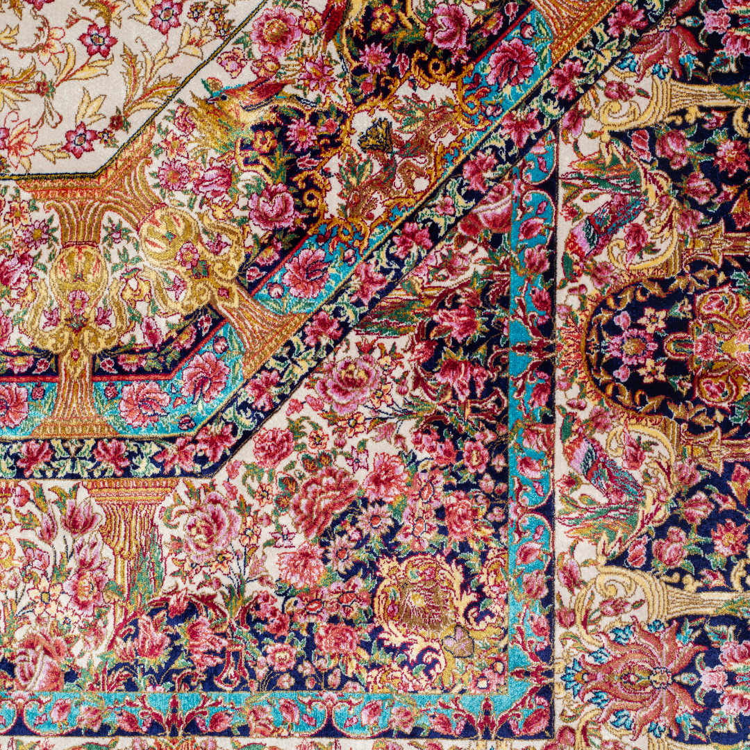 Paise silk rug featuring central medallion, navy border, and multi-colour floral motifs on an ivory base. Size 150x100 cms.