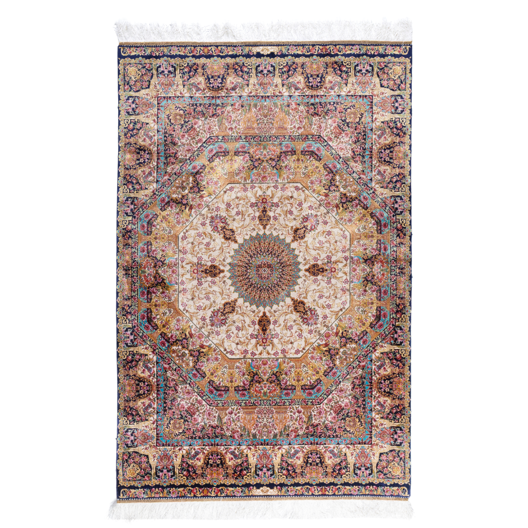 Paise silk rug featuring central medallion, navy border, and multi-colour floral motifs on an ivory base. Size 150x100 cms.