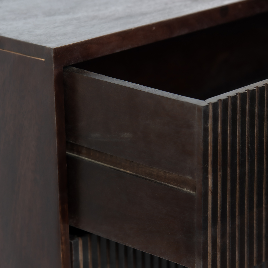 Featuring a Brown Wood Chest of Drawer in striped pattern, the Pasari collection enhances your space with intricately handcrafted designs that elevate your home and living aesthetics.