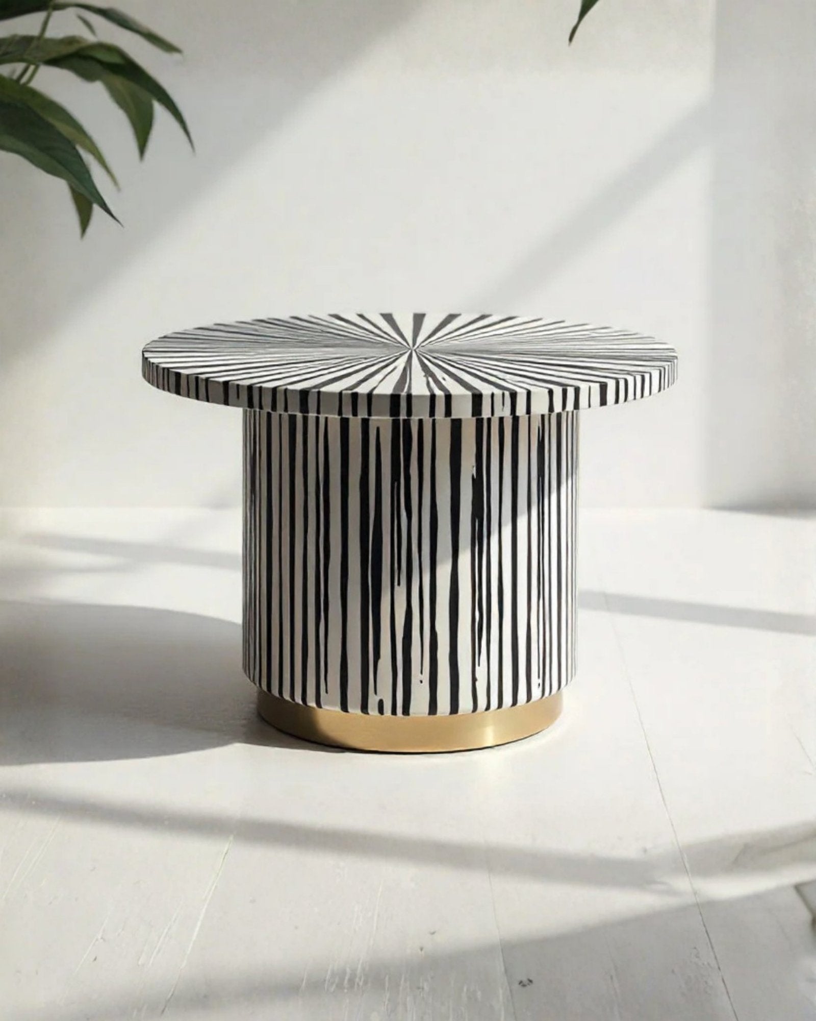 Ray Dining Table, black and white bone inlay design with brass base, handcrafted sunburst and stripe pattern by Tabeer Homes.