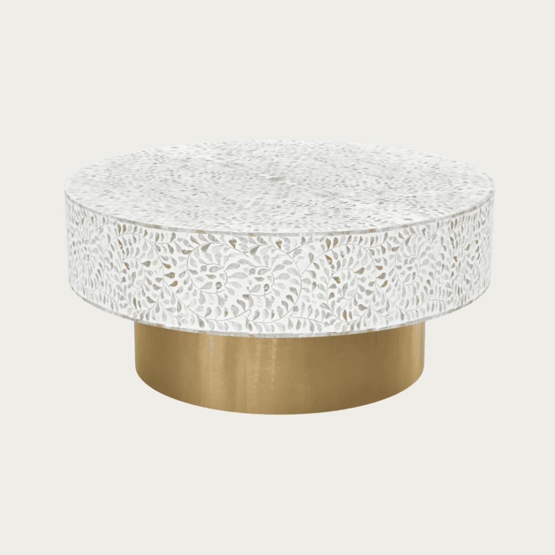 Round white mother of pearl inlay coffee table with floral design and a gold cylindrical base. Available in 3 size variants.
