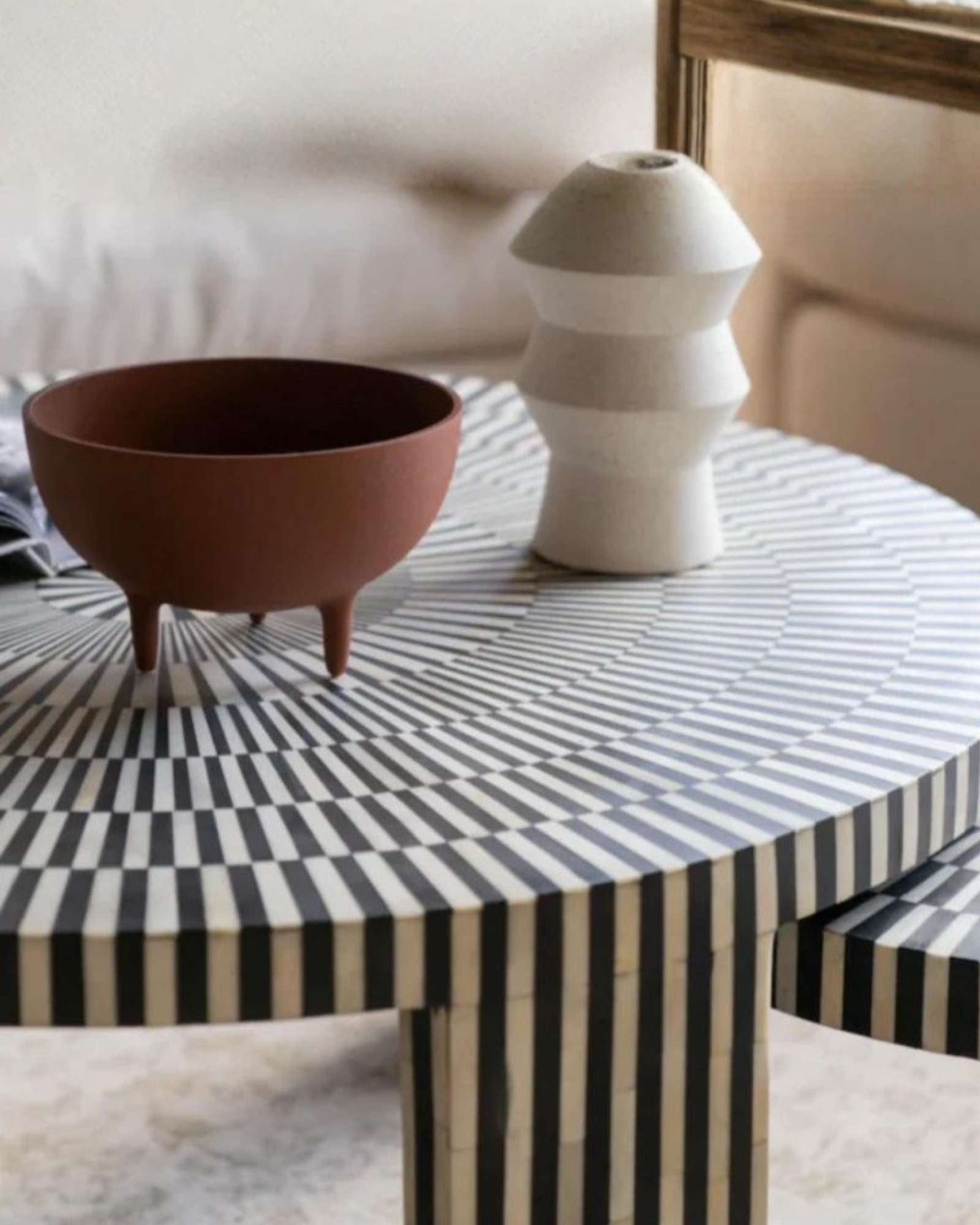 Discover the Saphed Nesting Coffee Table, handcrafted in black and white bone inlay. A striking sunburst design perfect for modern and luxury interiors.