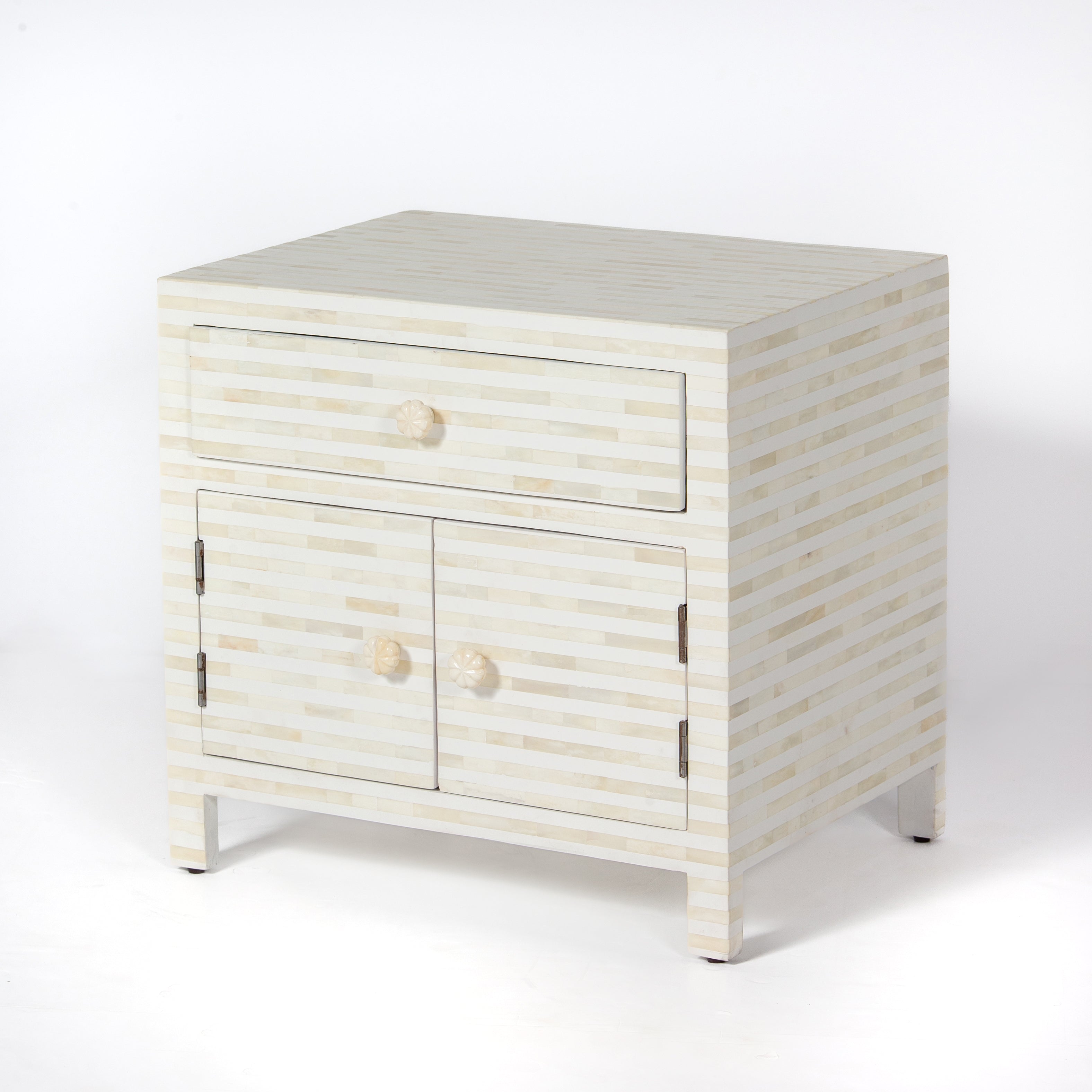 The Saphed Side Drawer features white bone inlay with cabinet doors and a drawer. A graceful accent for luxury interiors.