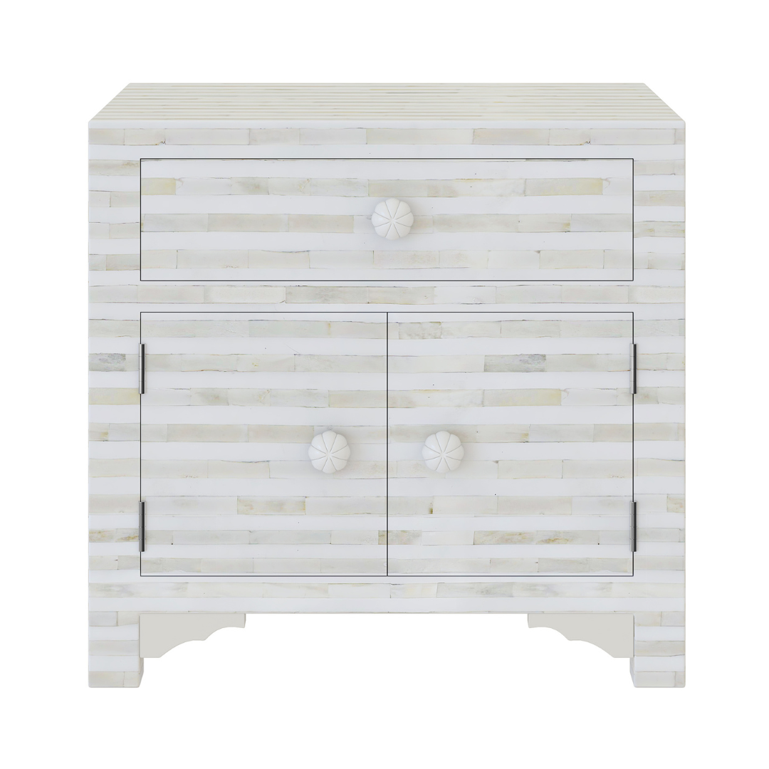 The Saphed Side Drawer features white bone inlay with cabinet doors and a drawer. A graceful accent for luxury interiors.