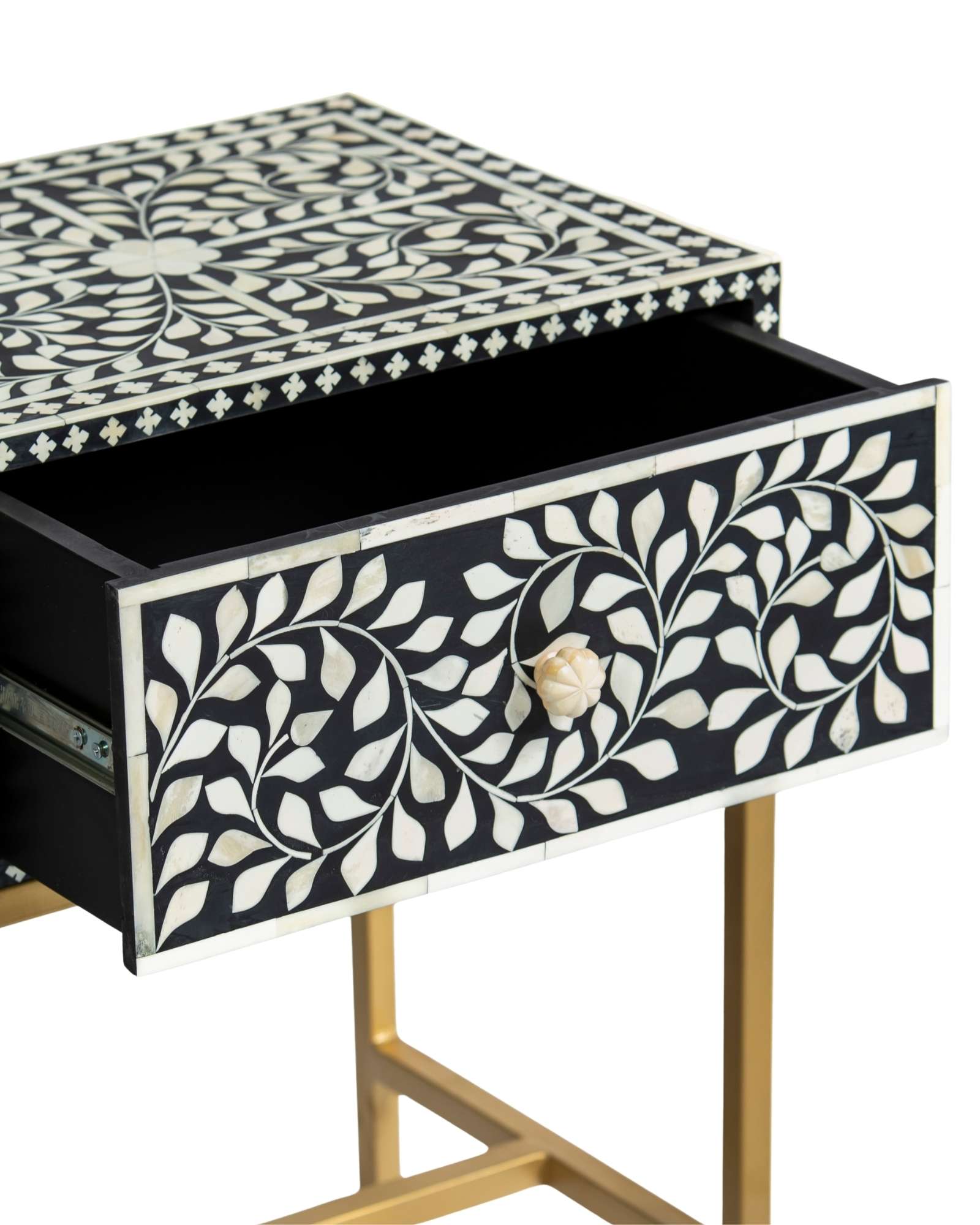 Bone inlay side drawer featuring floral vine pattern in black and white with metal base, handcrafted furniture piece