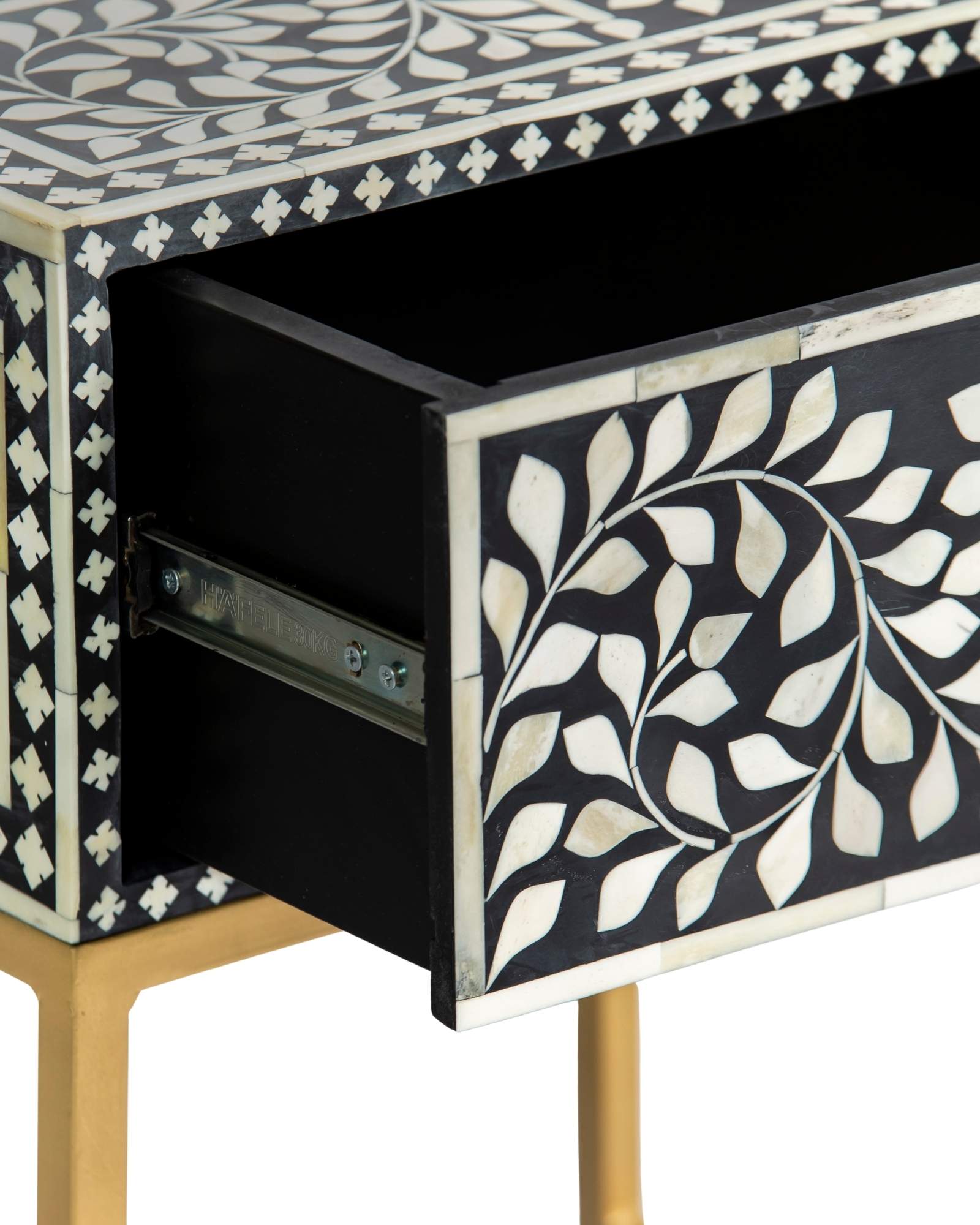 Bone inlay side drawer featuring floral vine pattern in black and white with metal base, handcrafted furniture piece