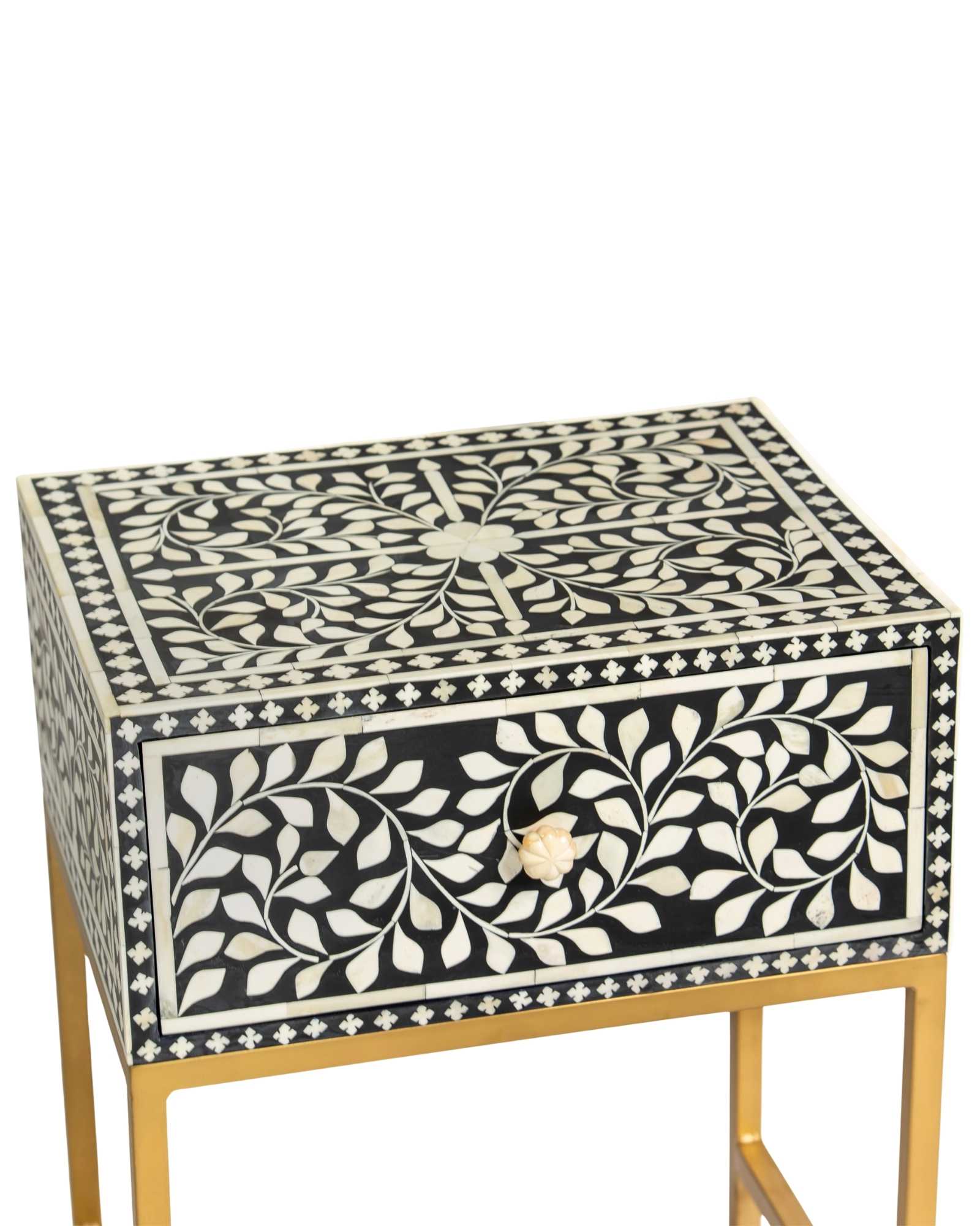 Bone inlay side drawer featuring floral vine pattern in black and white with metal base, handcrafted furniture piece