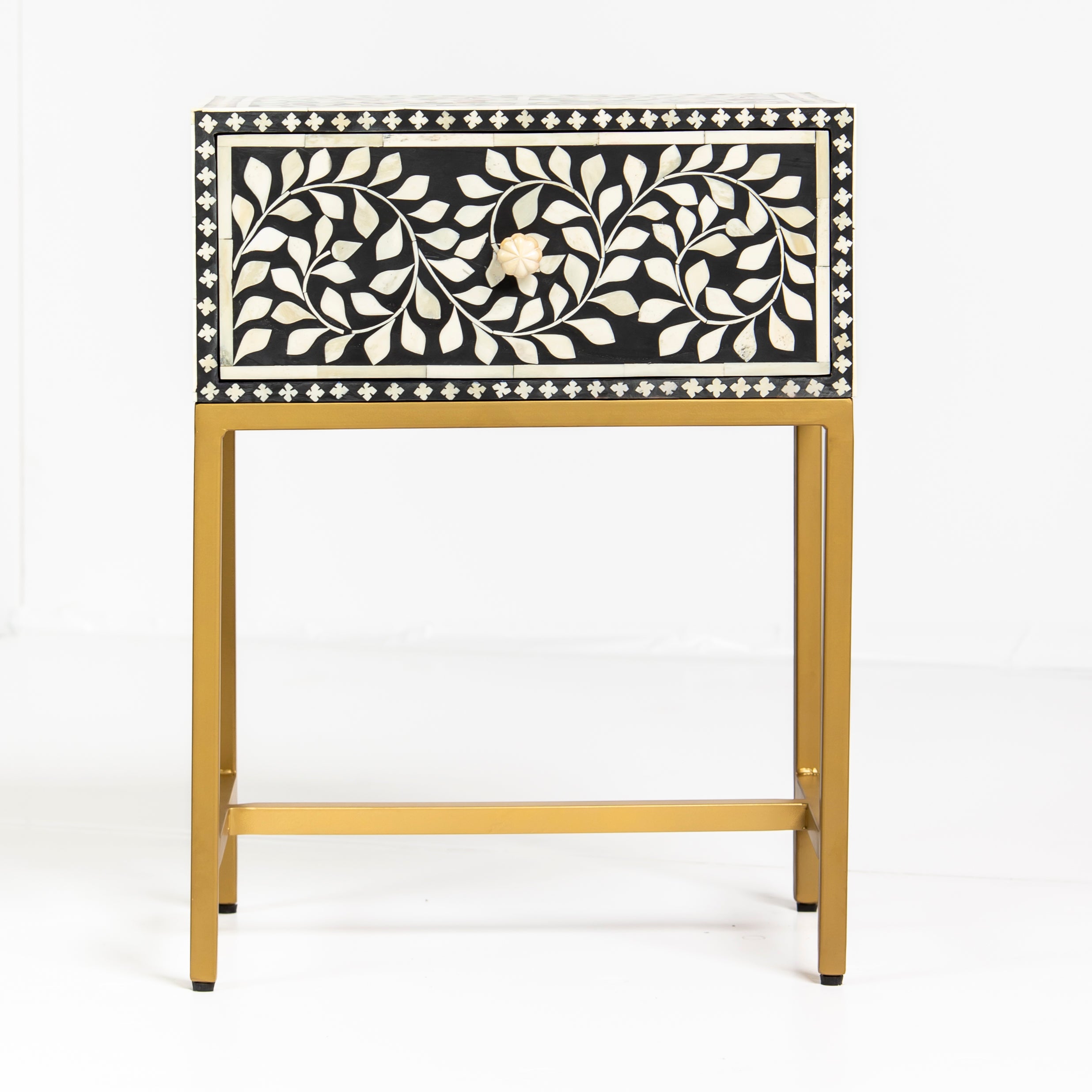Bone inlay side drawer featuring floral vine pattern in black and white with metal base, handcrafted furniture piece