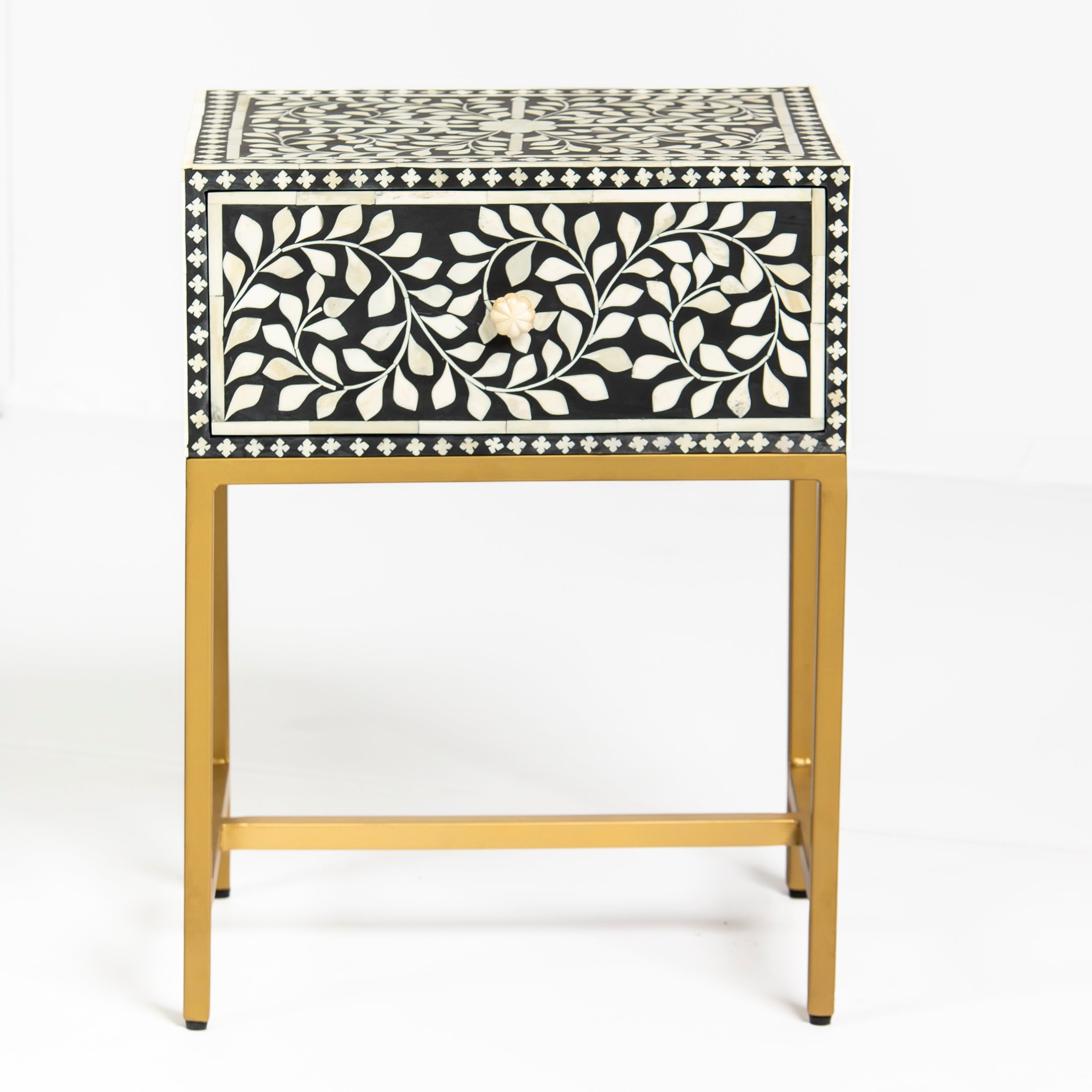 Bone inlay side drawer featuring floral vine pattern in black and white with metal base, handcrafted furniture piece