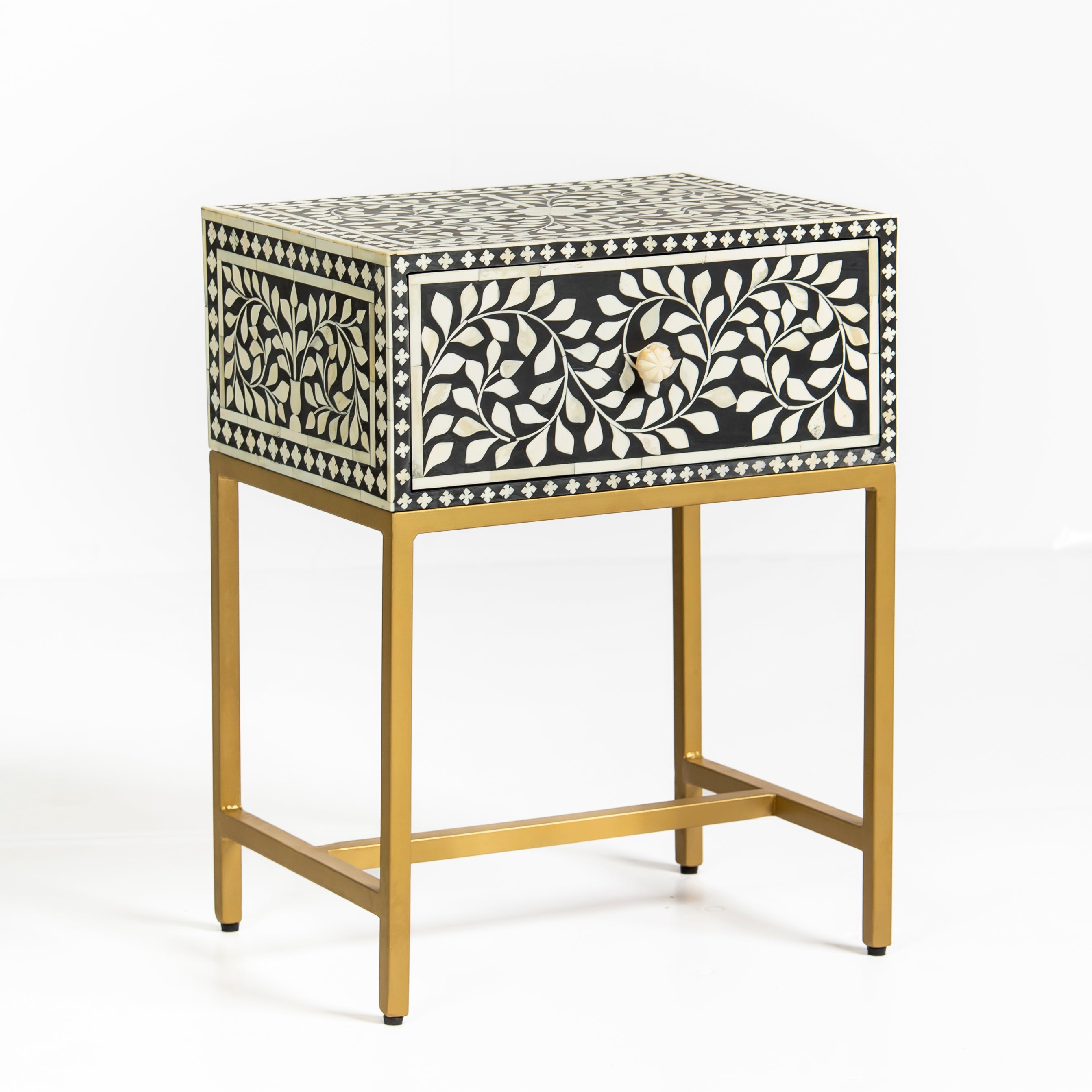 Bone inlay side drawer featuring floral vine pattern in black and white with metal base, handcrafted furniture piece