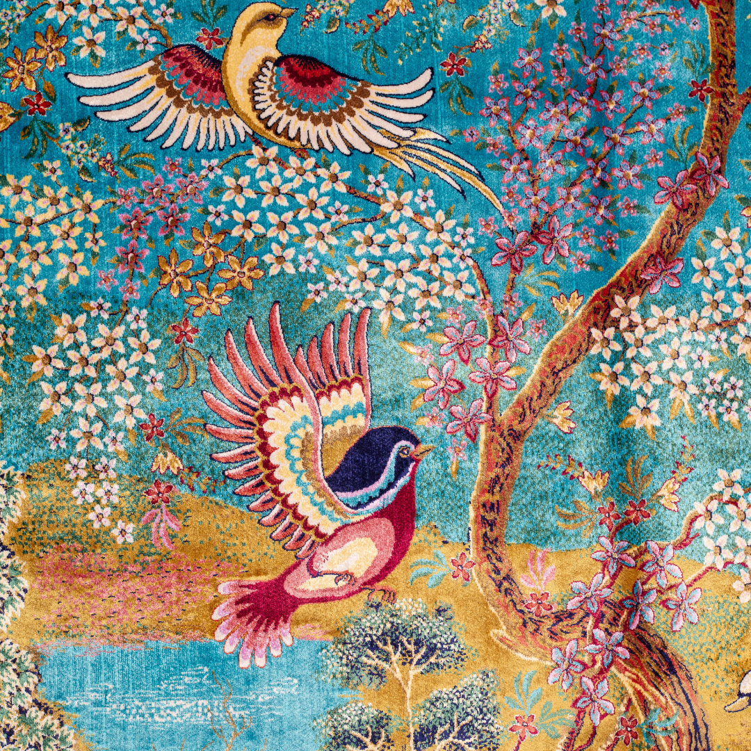 Luxurious silk rug with turquoise base, floral borders, and tree of life with colorful birds and swans.