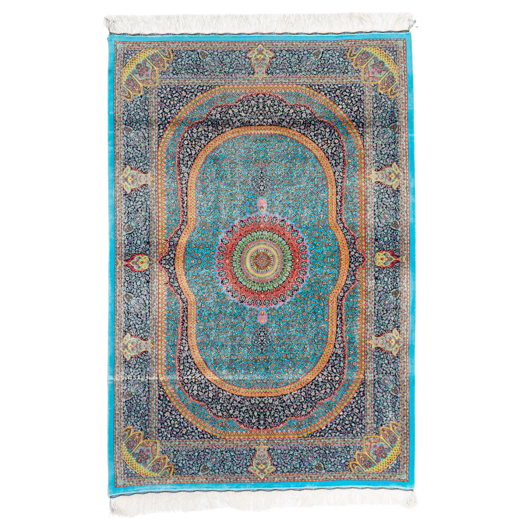 Vortex Silk Rug featuring a central floral medallion on a turquoise base with red, green, and black detailing, size 150x100 cm.