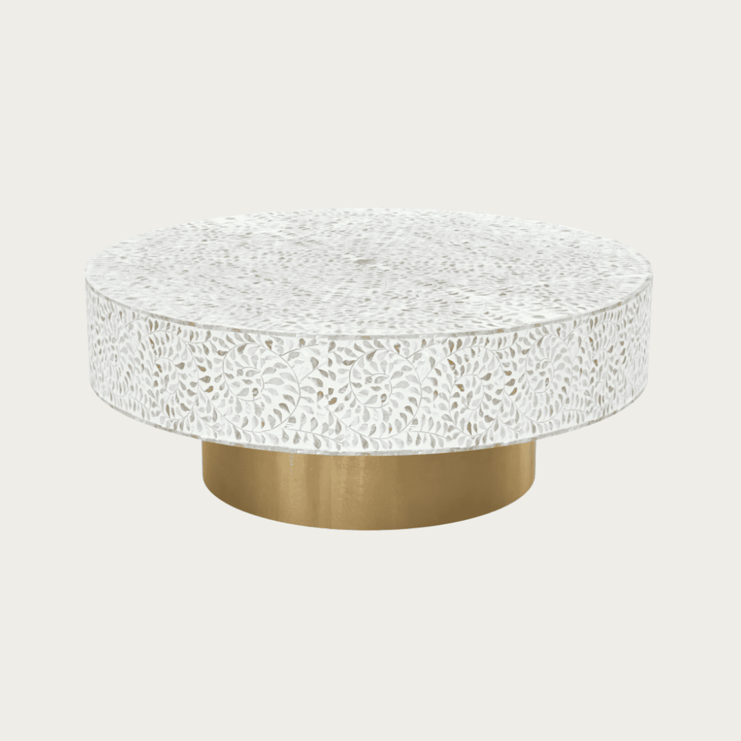 Round white mother of pearl inlay coffee table with floral design and a gold cylindrical base. Available in 3 size variants.
