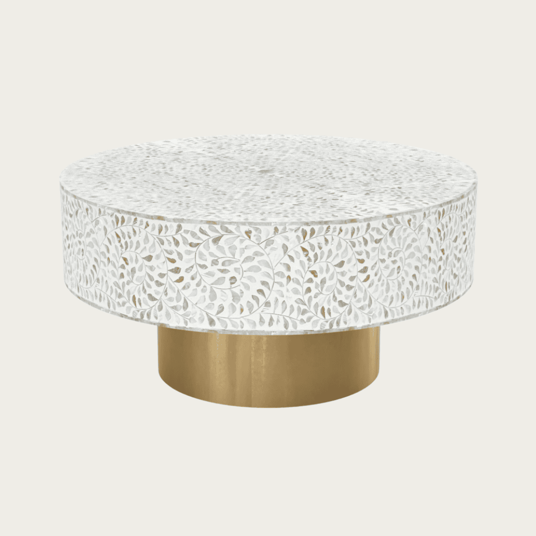 Round white mother of pearl inlay coffee table with floral design and a gold cylindrical base. Available in 3 size variants.