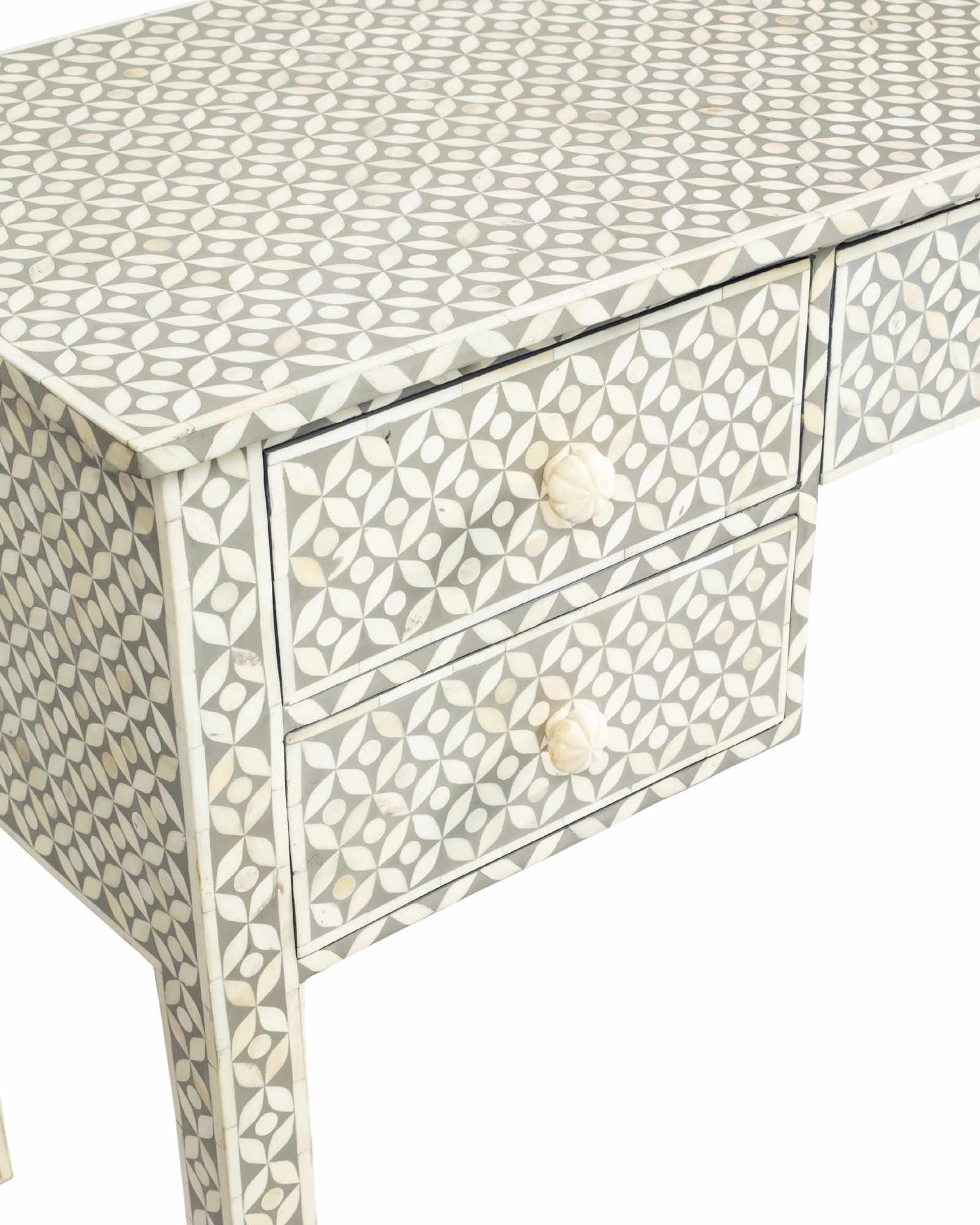 Grey bone inlay console desk with five drawers and geometric design, handcrafted with detailed knobs and artisan craftsmanship.