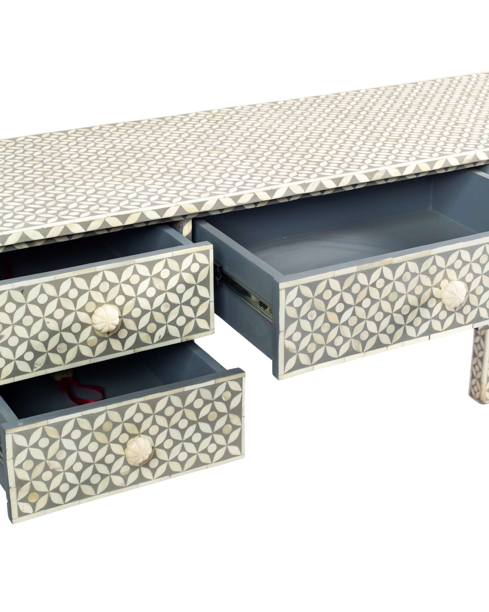Grey bone inlay console desk with five drawers and geometric design, handcrafted with detailed knobs and artisan craftsmanship.