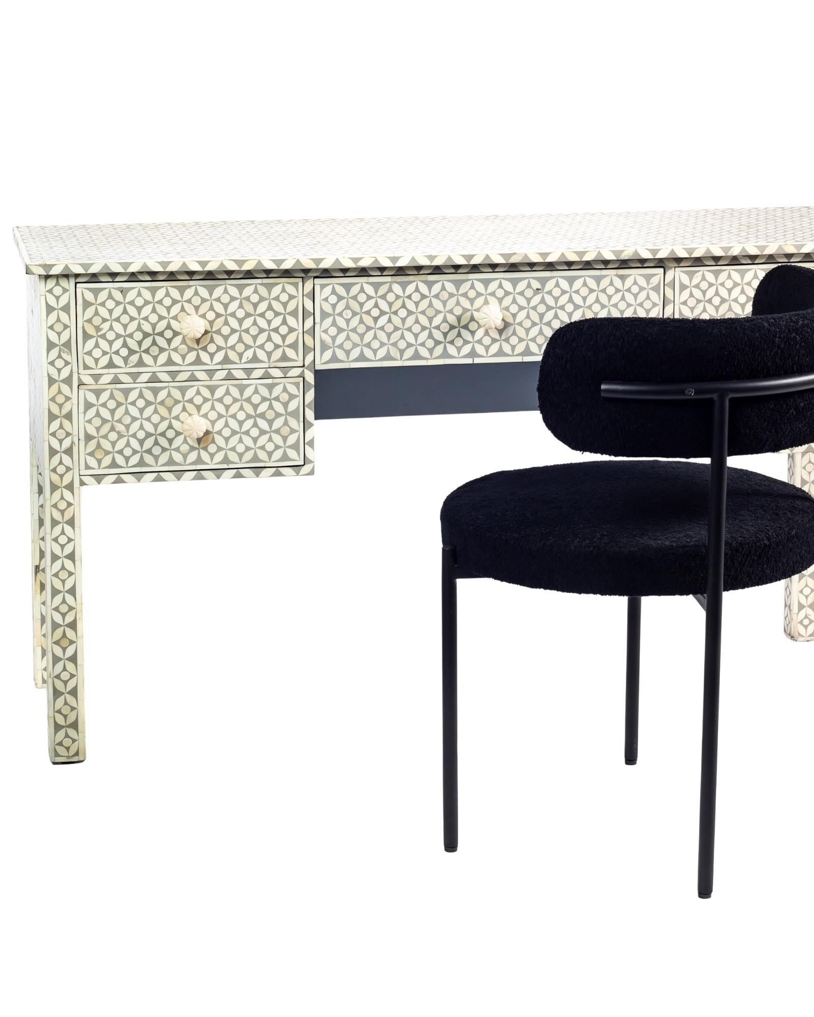 Grey bone inlay console desk with five drawers and geometric design, handcrafted with detailed knobs and artisan craftsmanship.