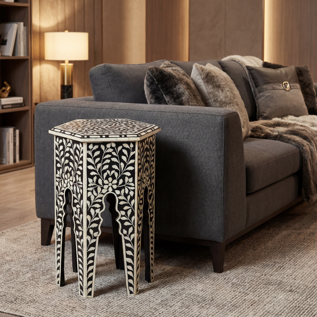 Handcrafted Yasmine side table in black bone inlay with a hexagonal form and arched legs, perfect as a refined accent piece.