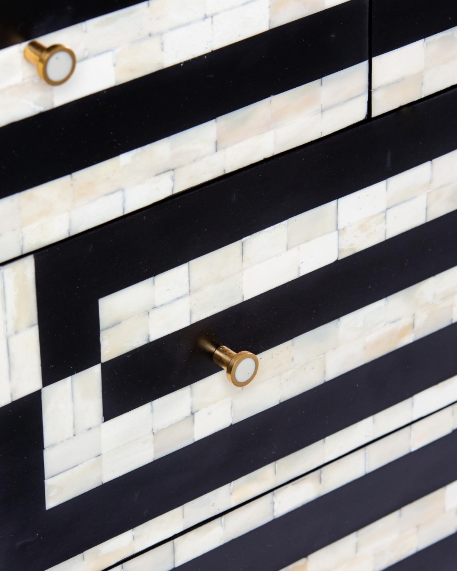 Zuri Striped Chest of Drawers in Black and white bone inlay by Tabeer Homes, featuring 7 drawers.