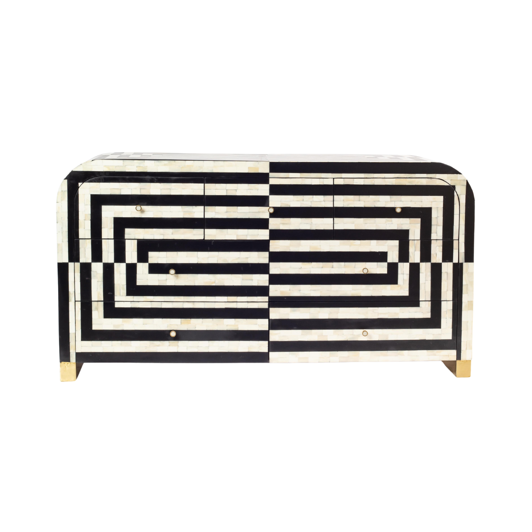 Black bone inlay chest of drawers with curved corners, brass knobs, and maze-inspired geometric design, handcrafted for modern interiors.