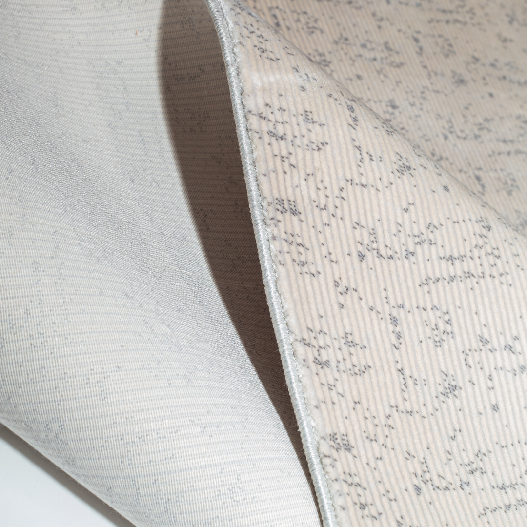 Modern abstract Cotton rug with copper linear pattern on a cream base, sized 350x250 cms – luxurious and contemporary.