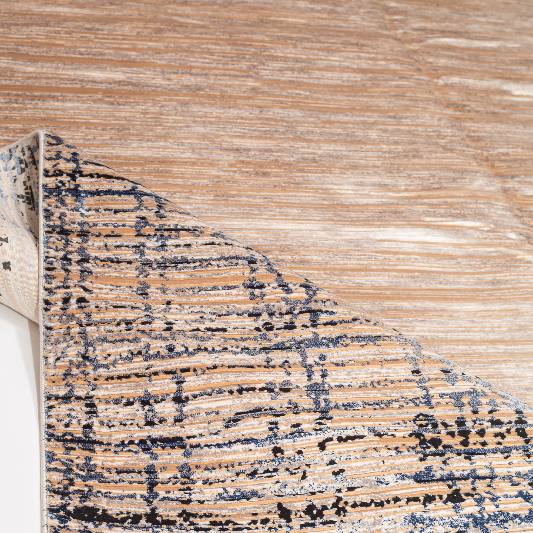 Alura cotton rug in 200x300 cms featuring a beige linear body with abstract navy border, modern and elegant in texture and tone.