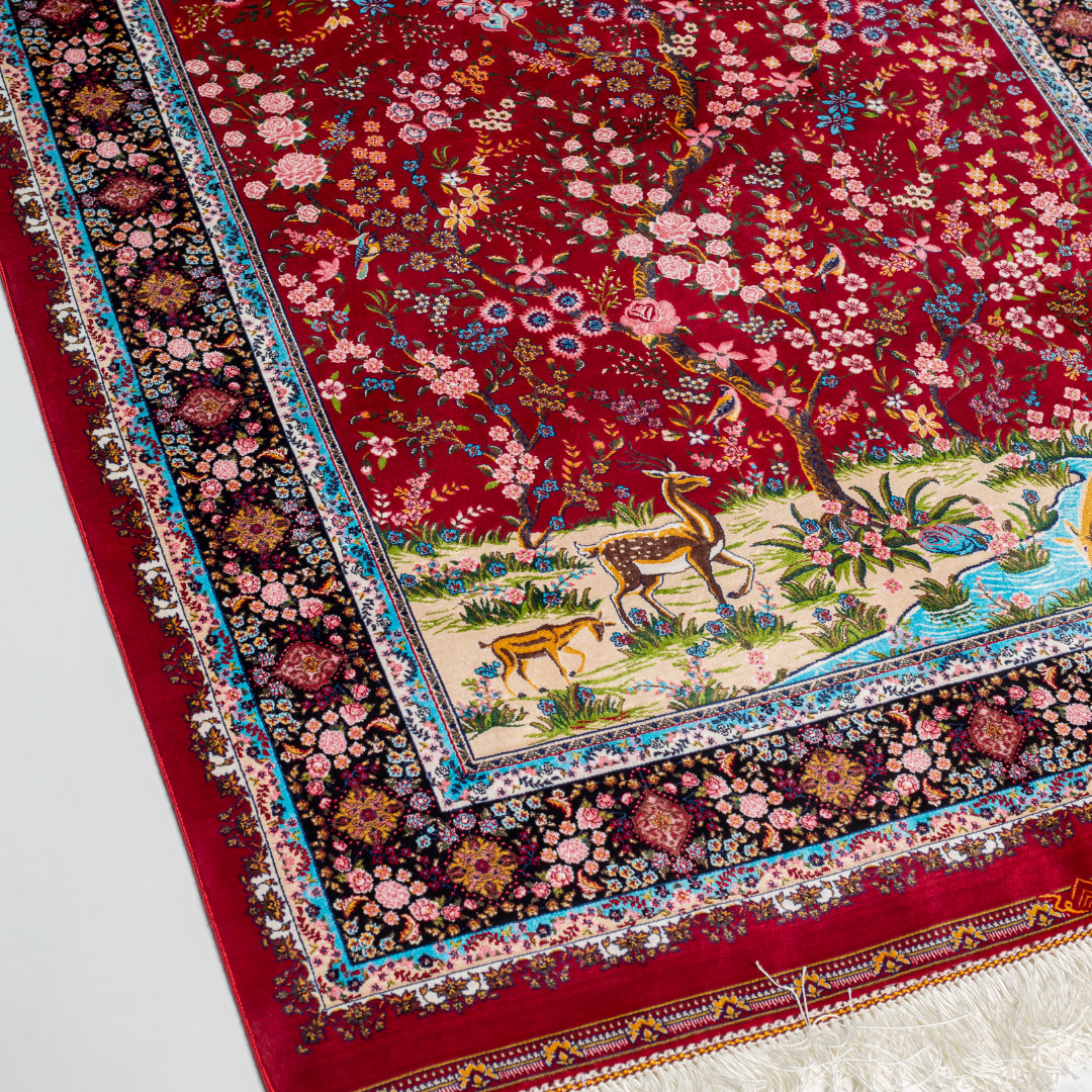 Ardena silk rug in 150x100 cm with beige base, bird and floral motifs, and intricate multicolor detailing.