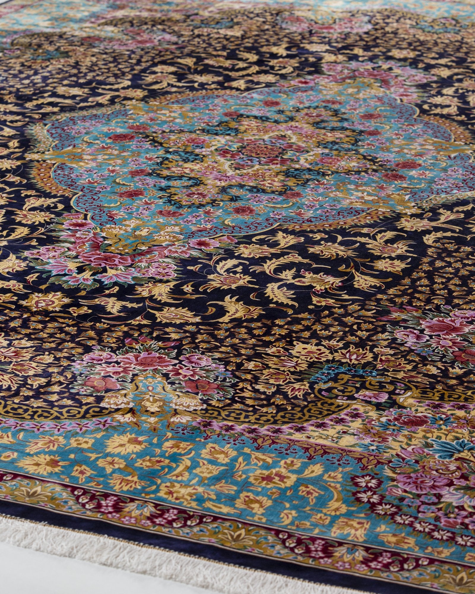 Ariana silk carpet floral motif close-up in turquoise and navy, 300 x 400 cm - Tabeer Homes Dubai