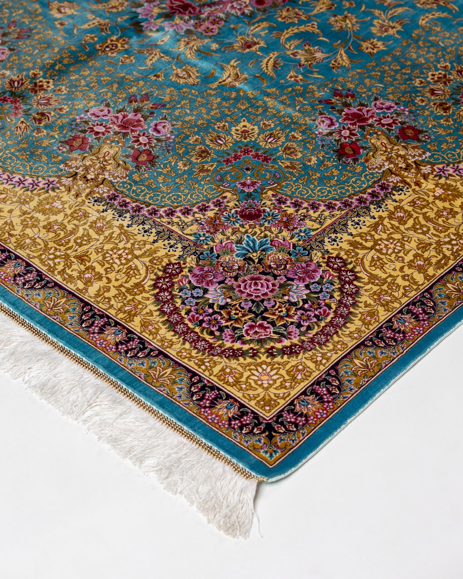 detail of the medallion on the Aurelia teal silk rug