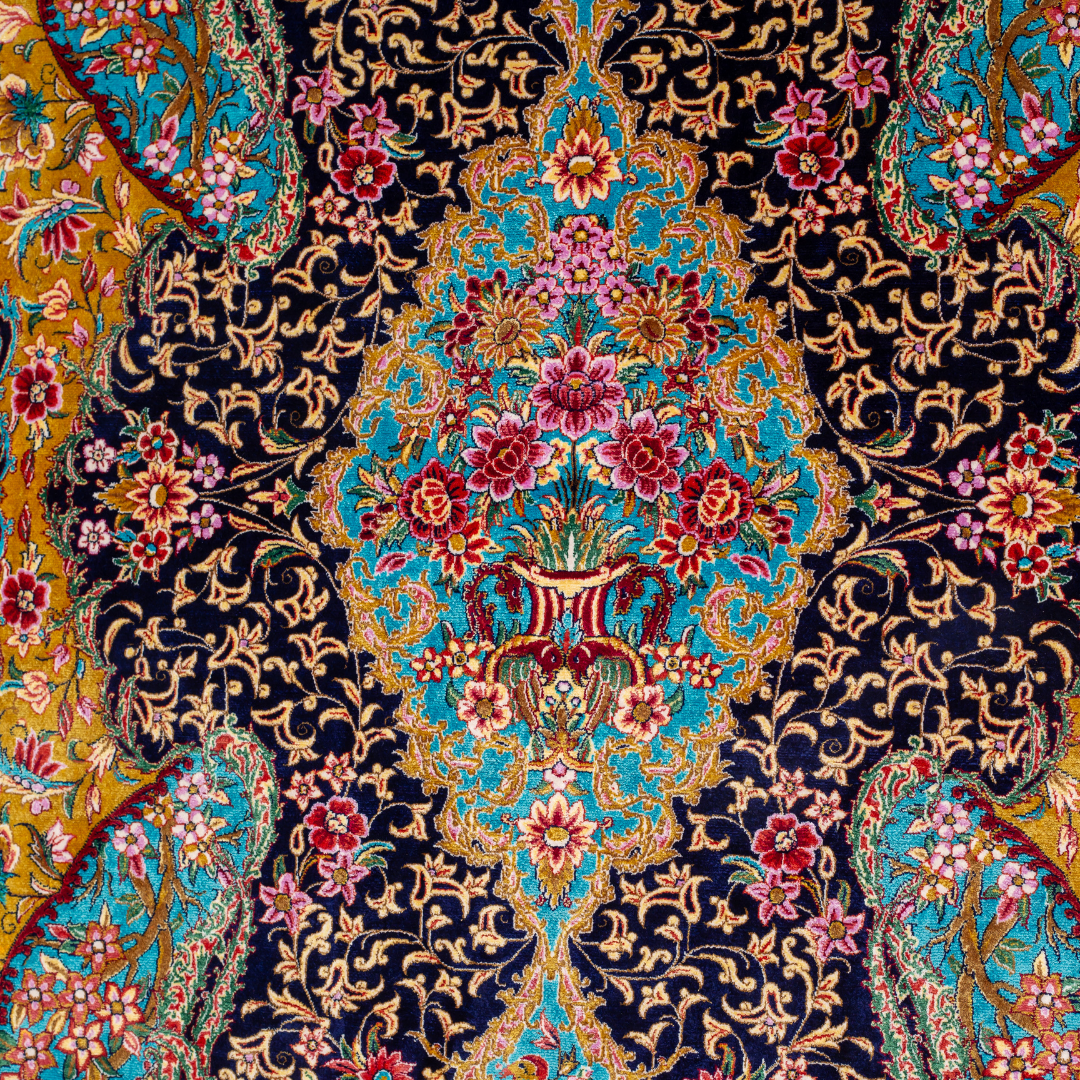 Azmin Silk Rug featuring navy base with gold vines, teal medallions, and pink floral detailing, 150x100 cm.