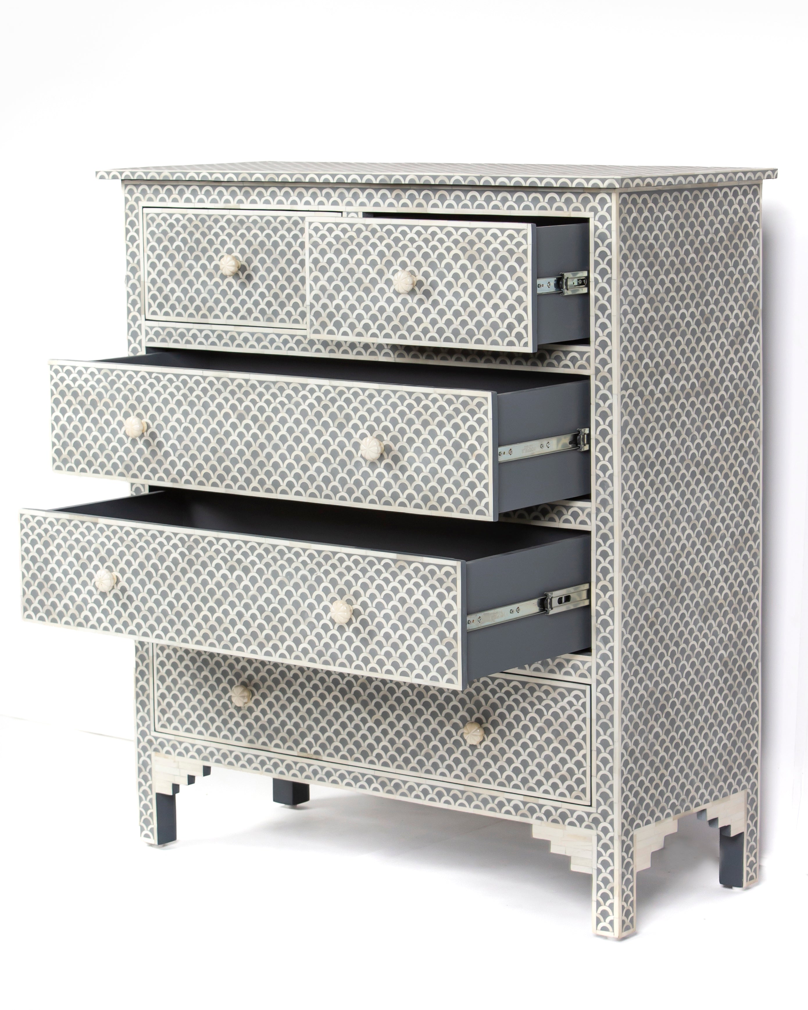 Angled view of Basel bone inlay chest with open drawers