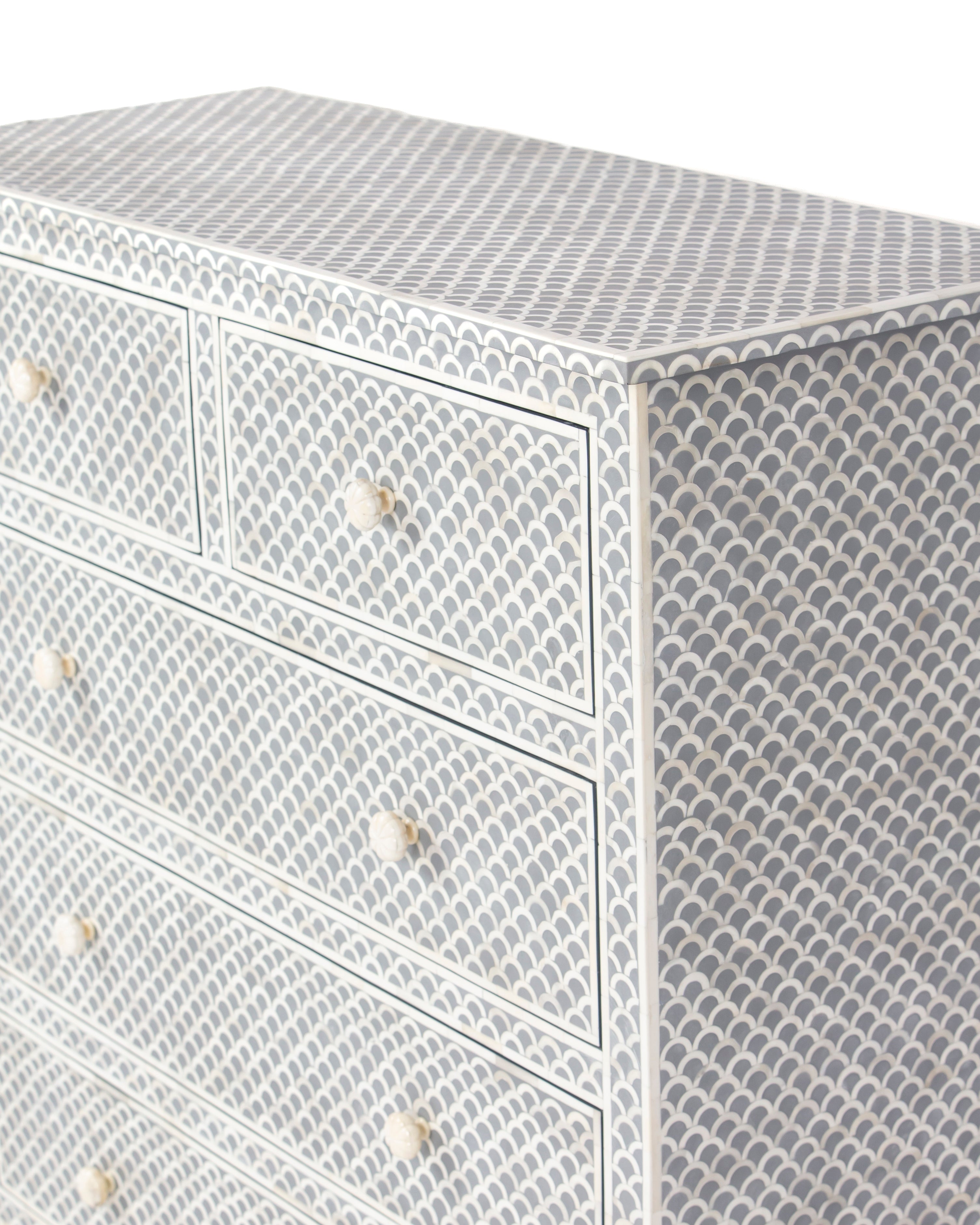 Top corner of Basel chest showing fish scale inlay on side panel