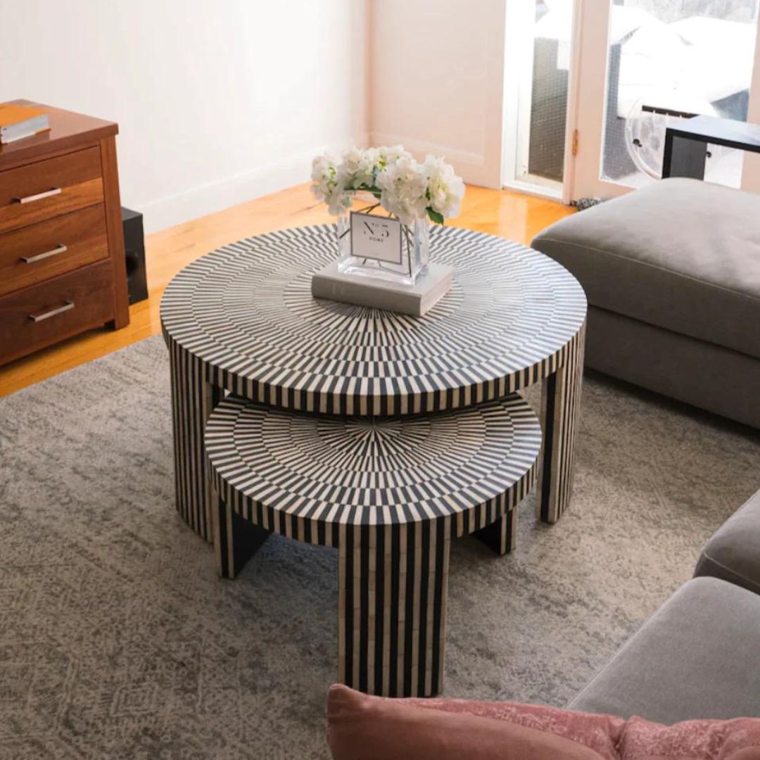 Discover the Saphed Nesting Coffee Table, handcrafted in black and white bone inlay. A striking sunburst design perfect for modern and luxury interiors.