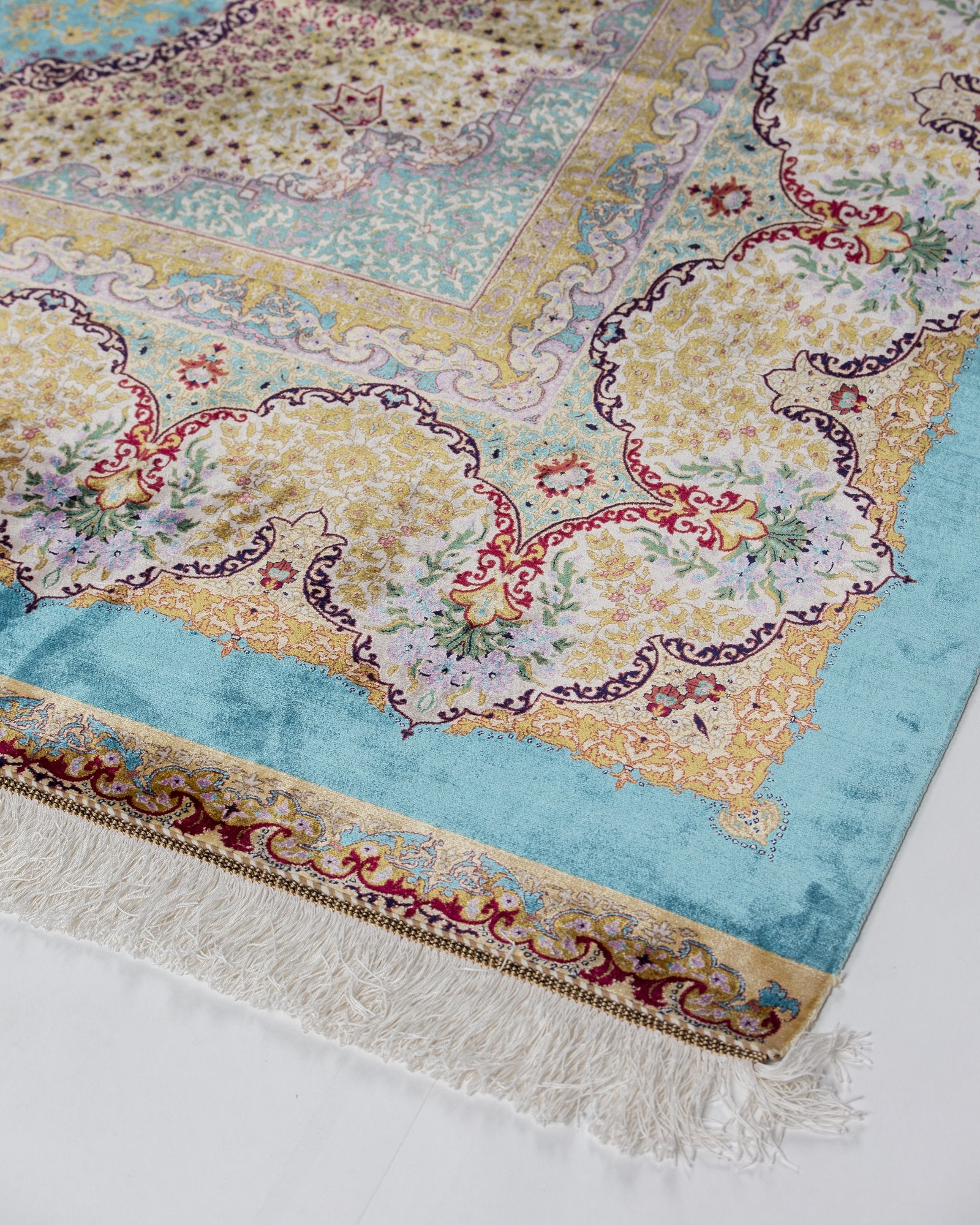 Camilla Persian silk rug folded corner showing fine weave, aqua blue 200 x 300 cm - Tabeer Homes Dubai