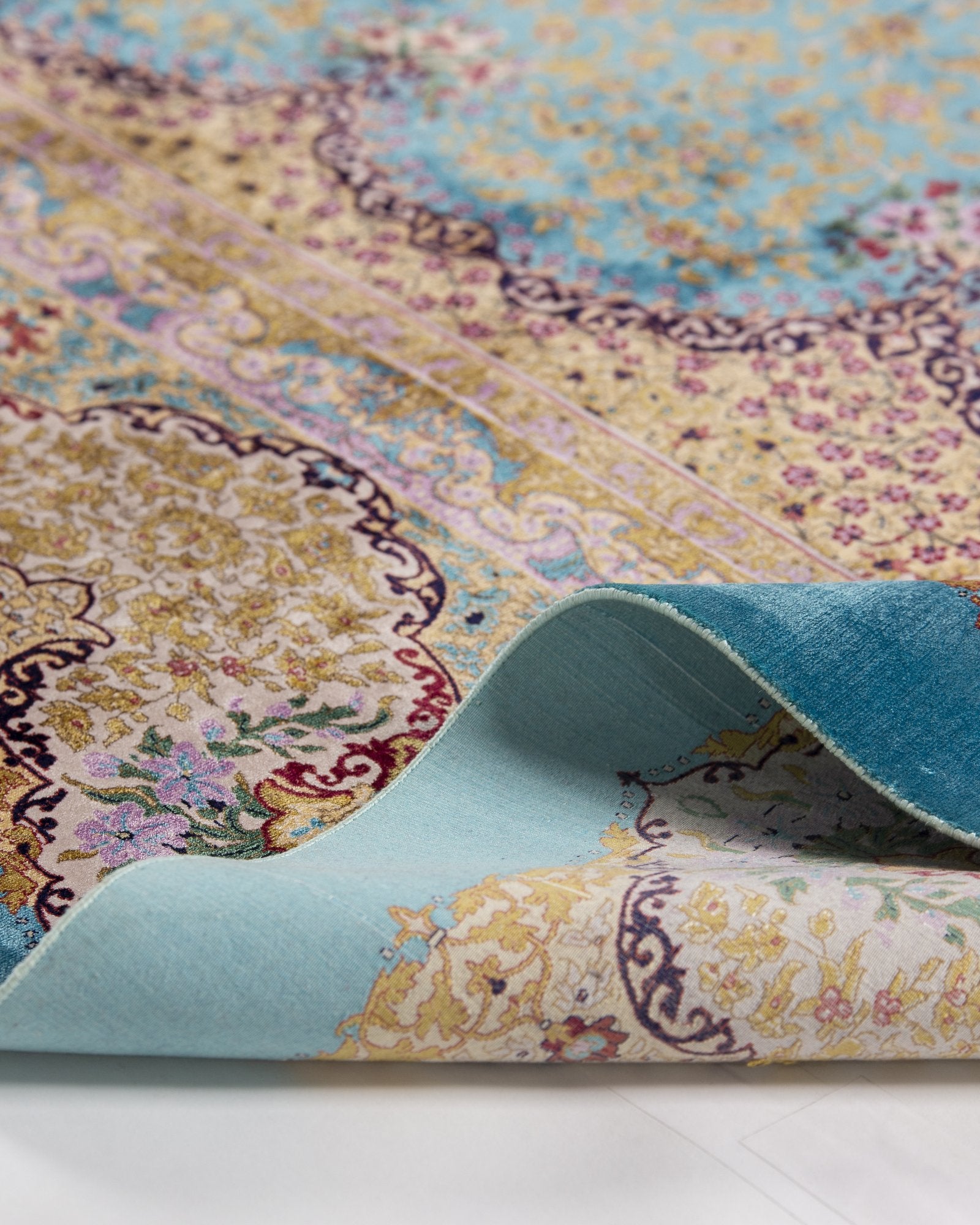Camilla Persian silk rug corner motif detail in aqua blue, 200 x 300 cm - Tabeer Homes Dubai