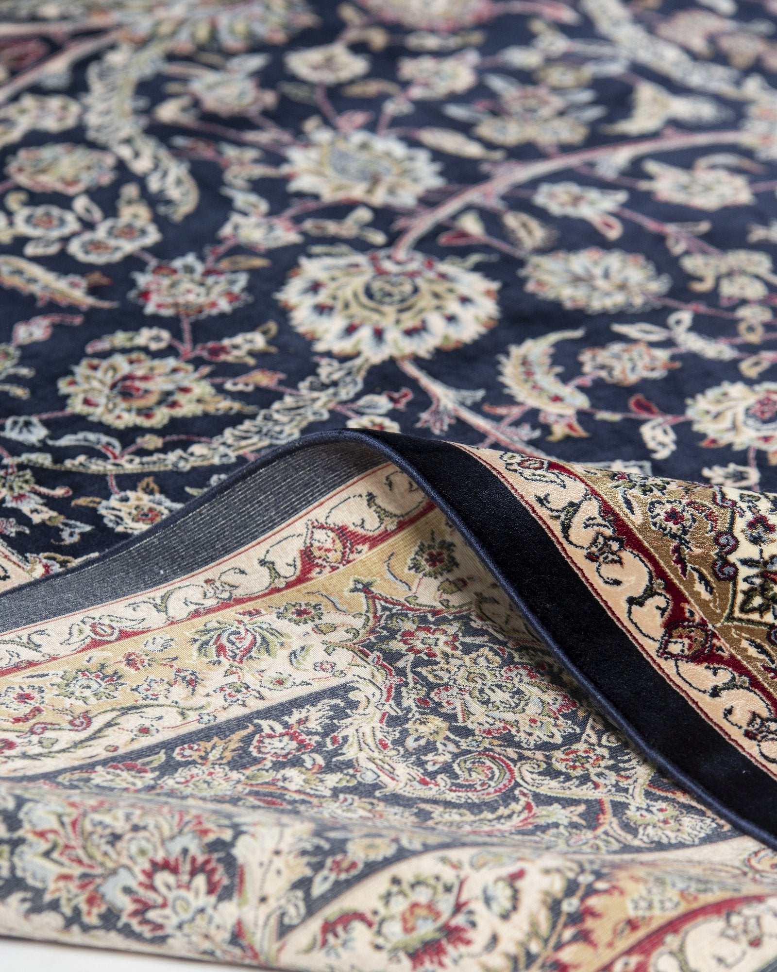 Cyrene Persian silk rug folded corner showing fine weave, midnight navy 250 x 350 cm - Tabeer Homes Dubai